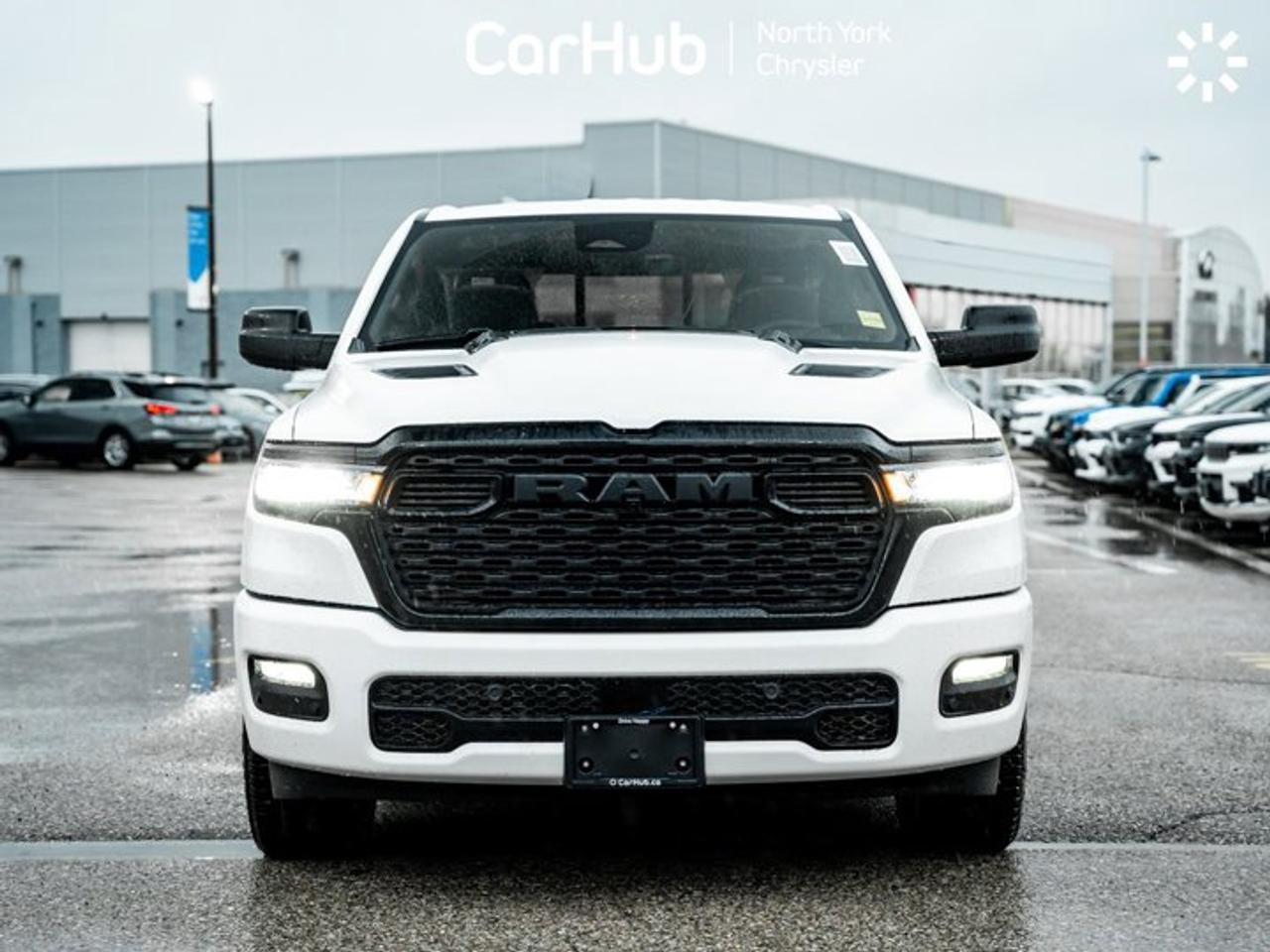 2026 RAM 1500 Express 4x4 Crew Cab 5'7" Box Black Express Edition Tonneau Cover Side Steps Photo