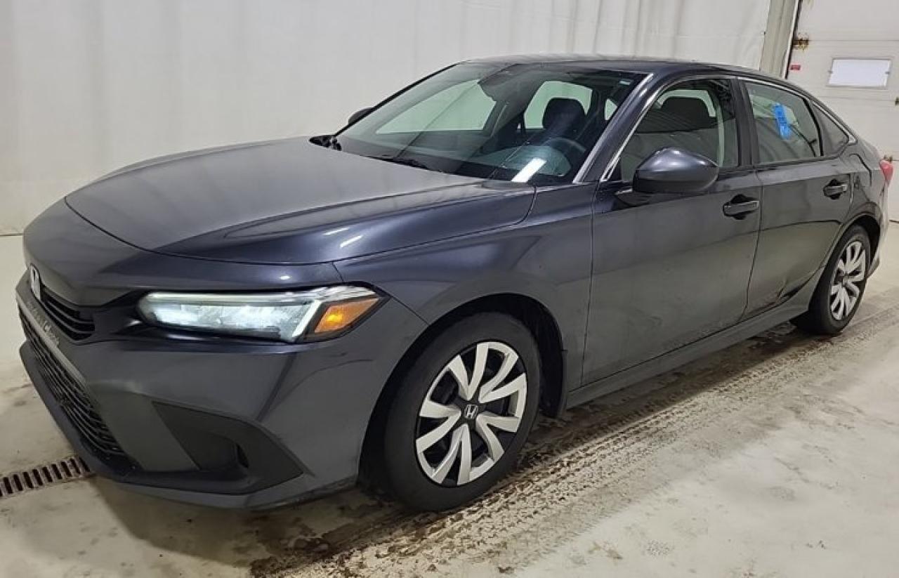 Come see this certified 2022 Honda Civic Sedan LX | Adaptive Cruise | Heated Seats | CarPlay + Android | Remote Start | Rear Camera | and More !. Its Automatic transmission and 2.0 L engine will keep you going. This Honda Civic Sedan has the following options: Reverse Camera, Remote Start, Air Conditioning, Adaptive Cruise, Heated Seats, Tilt Steering Wheel, Steering Radio Controls, Power Windows, Power Locks, and Traction Control. See it for yourself at Mark Wilsons Better Used Cars, 5055 Whitelaw Road, Guelph, ON N1H 6J4.MASSIVE SELECTION: 500+ vehicles in ONE LOCATION, all Live Market Priced for the best value!STRAIGHTFORWARD & TRANSPARENT PRICING: Our Advertised Price INCLUDES:Safety Certification! (No separate certification fee upcharge).FREE Carfax History Report!NO upcharge for paying cash!CONFIDENCE & PEACE OF MIND: 30-Day/3,000 km Warranty INCLUDED! Plus a 5-Day Exchange Privilege!*EASY FINANCING: Better-than-bank rates, $0 Down, and 3 Months No Payments available OAC. BAD CREDIT APPROVED HERE!WE BUY CARS: Get Top Dollar for your trade, or sell us your vehicle for CASH even if you dont buy ours!www.shopwilsons.comAn Honest, Transparent Buying Experience. Trusted in business since 1961!(Cash Prices Exclude HST and Licensing Fees only.)