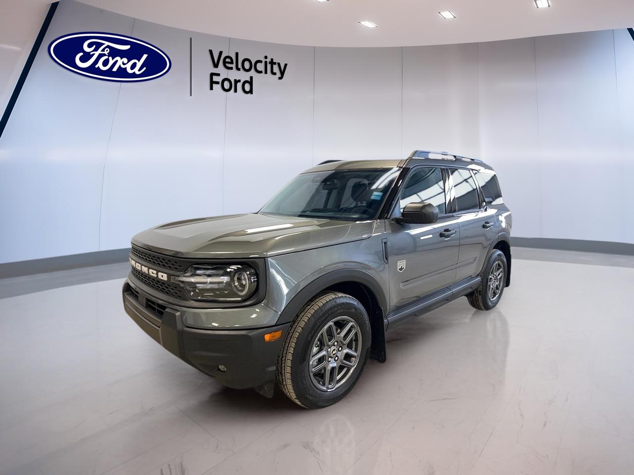 Meet the brand new 2026 Ford Bronco Sport Big Bend 4x4, now available at Velocity Ford in Moose Jaw. Finished in Grey with a Medium Light Smoked Truffle interior, this 4-door SUV is built for drivers who want everyday comfort with true 4WD confidence. With its 1.5 L gas engine and smooth 8-speed automatic transmission, its ready for commutes, weekend drives, and changing Prairie weather.

Inside this 2026 Ford Bronco Sport Big Bend 4x4, youll find heated front bucket seats, automatic climate control, and smart storage that makes daily life easier. The cabin layout is simple and driver-focused, with steering wheel audio controls and an adjustable steering wheel that help keep key functions close at hand. Add in tinted windows and ambient lighting, and you get a space that feels calm and modern.

On the road, this 2026 Ford Bronco Sport Big Bend 4x4 delivers a confident feel thanks to stability control, anti-lock brakes, and a full set of airbags. A backup camera supports tight parking spots, while features like blind spot monitoring and lane departure warning help you stay aware on busy streets and highways. Its a strong fit for families and anyone who values peace of mind.

At Velocity Ford, we know connectivity matters. This 2026 Ford Bronco Sport Big Bend 4x4 includes Bluetooth integration, satellite radio, and a WiFi hotspot so you can stay connected on the go. LED headlamps and automatic headlights help you see clearly as conditions change, while heated mirrors and a rear window defroster are welcome upgrades during winter mornings in Moose Jaw.

FEATURES OF THE Bronco Sport Big Bend 4x4  
»» 4WD capability for confident all-season traction  
»» 1.5 L gas engine, everyday efficiency  
»» 8-speed automatic for smooth shifting  
»» Brand new SUV, ready for delivery  

ADVANCED SAFETY FEATURES  
»» Anti-lock braking system for controlled stops  
»» Blind spot monitor for safer lane changes  
»» Lane departure warning adds driving confidence  
»» Backup camera for easier reversing  

PERFORMANCE AND EFFICIENCY  
»» 1.5 L gas engine for daily driving  
»» Four-wheel drive for added road grip  
»» 8-speed automatic transmission for smooth power  
»» Power steering for easy low-speed control  

COMFORT AND CONVENIENCE  
»» Heated front seats for cold mornings  
»» Automatic climate control for steady comfort  
»» Power windows for quick ventilation control  
»» Push button start for easy getaways  

TECHNONOLGY AND CONNECTIVITY  
»» Bluetooth integration for hands-free calling  
»» Steering wheel audio controls within easy reach  
»» Satellite radio for more listening choices  
»» WiFi hotspot for connected travel  

CARGO SPACE  
»» Rear trunk access for easy loading  
»» Four-door layout improves daily usability  
»» Practical SUV space for errands and trips  
»» Room to carry gear and groceries  

WHAT OTHER OWNERS LIKE  
»» Confident feel from four-wheel drive  
»» Helpful driver aids for daily commuting  
»» Heated seats for winter comfort  
»» Easy connectivity with Bluetooth and WiFi  

This 2026 Ford Bronco Sport Big Bend 4x4s VIN is: 3FMCR9BN4TRE04497.
