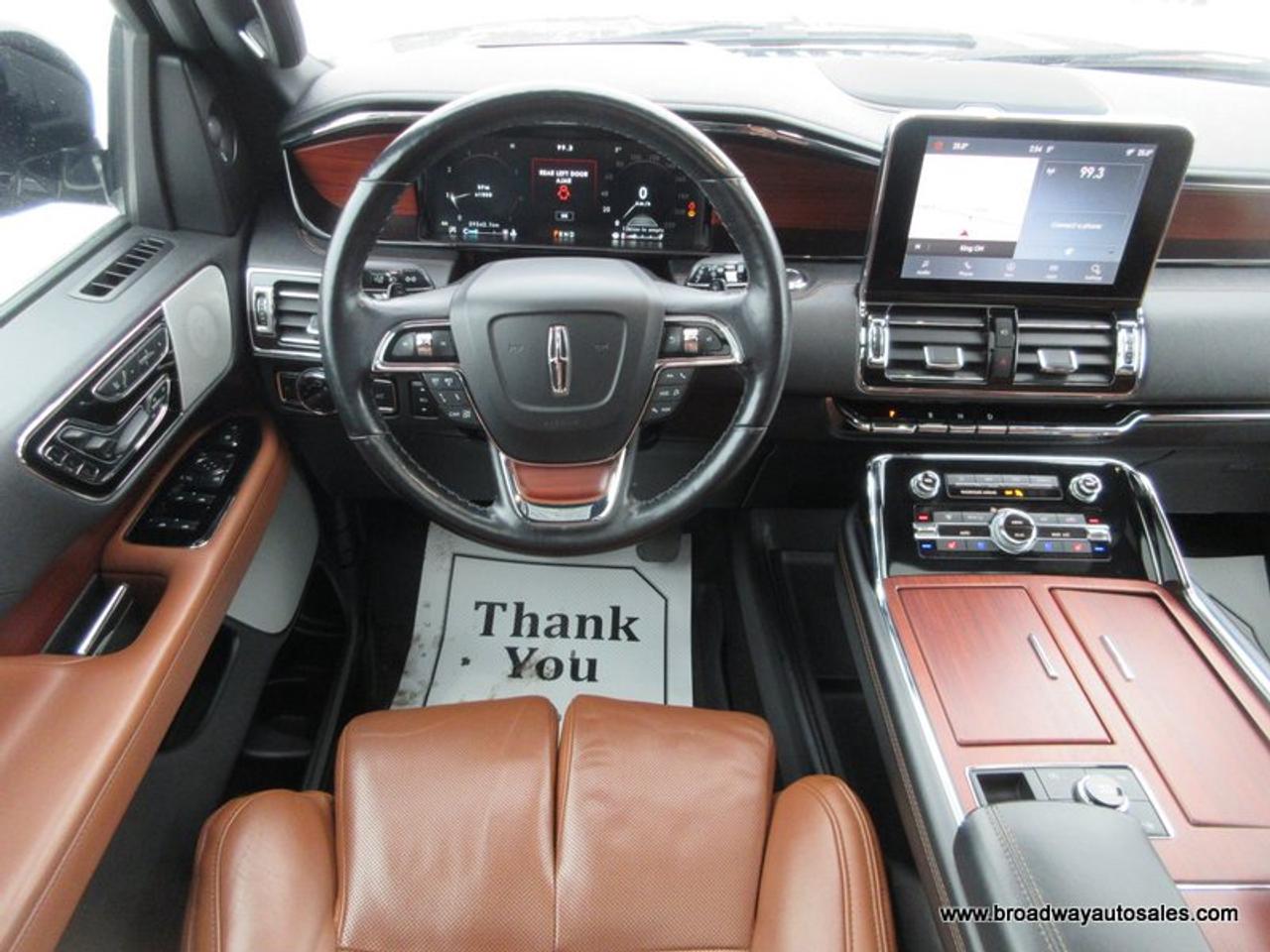 2021 Lincoln Navigator FOUR-WHEEL DRIVE RESERVE-PACKAGE 7 PASSENGER 3.6L - V6.. 4-WAY-CAPTAINS & 3RD ROW.. NAVIGATION.. PANORAMIC SUNROOF.. LEATHER.. HEATED SEATS & WHEEL.. Photo