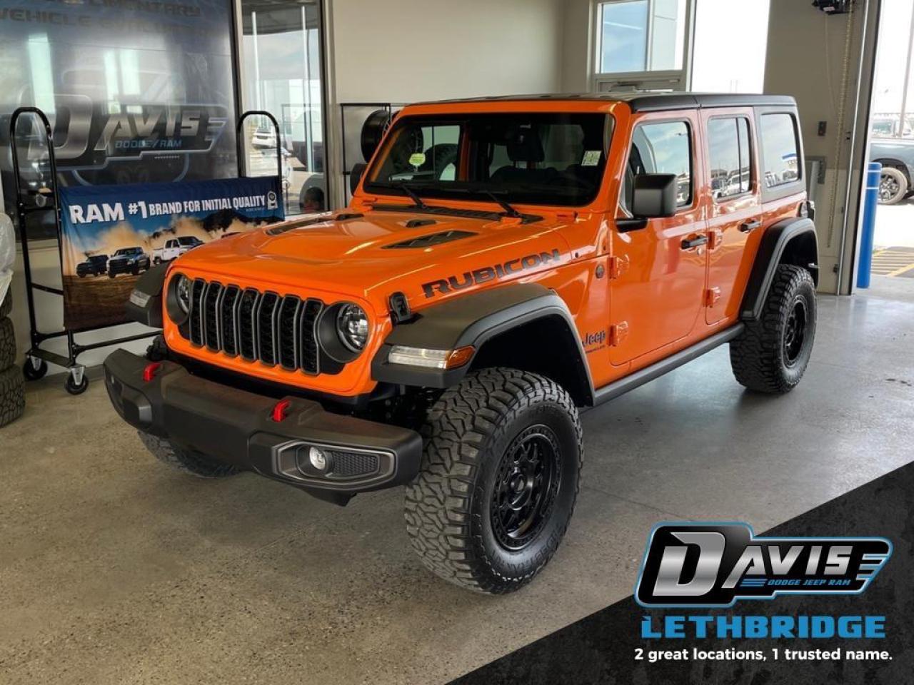 <b>Heavy Duty Suspension, Alpine Sound System, Heated Seats, Fog Lamps, Adaptive Cruise Control!<br /> <br /></b><br /> <br /> <br />The 2026 Jeep Wrangler Rubicon 4x4 is built for serious off-road performance while still delivering everyday comfort and advanced technology. Finished in eye-catching Joose, this four-door Wrangler stands out with Rubicon highline fender flares, red tow hooks, rock protection sill rails, a dual-vented hood, LED lighting, and 17-inch black alloy wheels wrapped in BFGoodrich off-road tires. Its bold design and Trail Rated® capability make it one of the most capable SUVs on or off the pavement.<br /><br />Power comes from the proven 3.6L V6 engine with ESS, paired with a smooth 8-speed automatic transmission and the legendary Rock-Trac® 4:1 heavy-duty 4WD system. Front and rear electronic locking differentials, a disconnecting front sway bar, 4.10 axle ratio, full-float Dana rear axle, skid plates, and Off-Road+ mode deliver unmatched control on tough trails, steep climbs, and challenging terrain. This Rubicon is engineered to handle rocks, mud, sand, and snow with confidence.<br /><br />Inside, the Wrangler Rubicon blends rugged utility with modern refinement, featuring Uconnect 5 NAV with a 12.3-inch touchscreen, Apple CarPlay, Android Auto, Alpine premium audio, integrated off-road camera, and a 4G LTE Wi-Fi hotspot. Comfort highlights include heated front seats, heated steering wheel, automatic climate control, remote start, and a black 3-piece hard top for open-air freedom. Advanced safety features such as adaptive cruise control with stop, forward collision warning, ParkView rear backup camera, and multiple airbags round out this exceptional SUV. The 2026 Jeep Wrangler Rubicon is the ultimate choice for drivers who demand authentic Jeep capability without compromise.<br /> <br />To apply right now for financing use this link: <a href=https://lethbridge.davisdodge.ca/free-credit-check/ target=_blank rel=nofollow noopener noreferrer>https://lethbridge.davisdodge.ca/free-credit-check/</a><br /><br /> <br /><br />As a premier Chrysler, Dodge, Jeep and RAM dealership, Davis Dodge proudly offers an extensive selection of new and used vehicles to meet every drivers needs. Customers across Lethbridge, Fort Macleod, Taber, Claresholm, Coaldale, and beyond trust us for daily vehicle specials, certified service and parts, and a seamless online inventory experience. <br /><br /> With competitive financing options and expert support, we make car buying easy and enjoyable. <br /><br /> Ready to hit the road? Schedule your test drive today at Davis Dodge, your trusted Chrysler, Dodge, Jeep and RAM dealer in Lethbridge, Alberta.<br /><br /> Vehicle pricing offer shown expires 2026-03-31. <br /> Come by and check out our fleet of 60+ used cars and trucks and 120+ new cars and trucks for sale in Lethbridge. o~o