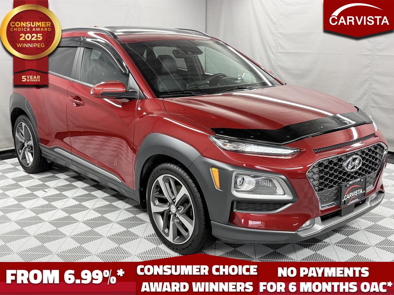CONSECUTIVE COMSUMER CHOICE AWARD WINNERS!

LEATHER HEATED SEATS/STEERING WHEEL, SUNROOF, HEADS UP DISPLAY, LANE ASSIST, BLIND SPOT MONITORING, ADAPTIVE CRUISE CONTROL, BLUETOOTH HANDSFREE, NAVIGATION, REVERSE CAMERA

The 2020 Hyundai Kona 1.6T Ultimate AWD is a compact SUV that punches above its weight, quick, confident in all seasons, and packed with premium tech. Under the hood, the turbocharged 1.6L engine delivers lively acceleration while the AWD system helps you stay planted through rain, snow, and slick intersections. Its the kind of vehicle that feels easy to park and maneuver in the city, yet still has the capability and comfort you want for highway commuting and weekend trips.

As the range topping Ultimate trim, this Kona brings a more upscale driving experience with high end features throughout the cabin. Youll typically find leather seating, heated front seats and a heated steering wheel, a power sunroof, and advanced infotainment with smartphone integration and a premium audio setup. The driver focused layout makes everything simple to reach and use, while the elevated seating position gives you a great view of the road.

Safety and convenience are also major highlights, expect a strong suite of driver assist features designed to reduce stress in traffic and add confidence on longer drives. With its turbo power, refined Ultimate trim, and go anywhere AWD traction, the 2020 Kona 1.6T Ultimate AWD is an ideal choice for drivers who want a fun to drive SUV without giving up comfort, technology, or year round practicality.

5 years running, consecutive receivers of the prestigious Consumer Choice Award in 2021, 2022, 2023, 2024 and 2025! Low rate dealer arranged financing available! 
At Carvista we offer a unique buying experience, with no deceiving finance gimmicks and trades are welcome but not required! Carvista is a family operated business that has been in business for over 25 years, and has earned a A+ BBB Accreditation and outstanding consumer accolades. Offering 175 quality pre-owned vehicles, all are certified and Carfax verified, most with remaining factory warranty and a modern facility located on Winnipegs Regent Ave strip. We welcome you to visit us at 1201 Regent Ave W, at Carvista, and drive away in a like new vehicle for less. In many cases we can offer no payments for 6 months! Dont let your trade or credit stop you, we accept any kind, any time. CARVISTA.CA, "Where the deals are".
 Prices and payments exclude GST OR PST Carvista Inc. 
Dealer Permit # 1211, Category: Used Vehicle 
Please verify all ad details with a Carvista sales person, vehicle may not be exactly as shown.