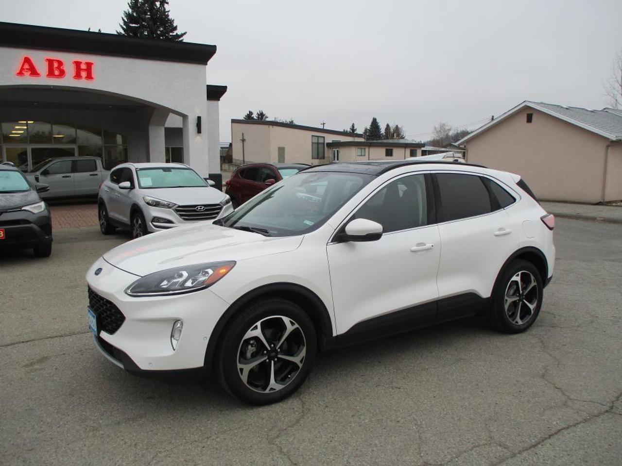 Experience comfort, performance, and premium features with this 2020 Ford Escape Titanium AWD in immaculate condition. This 1-owner SUV has only 67,816 kms and is powered by a fuel-efficient yet responsive 2.0L EcoBoost engine paired with a smooth 8-speed automatic transmission, delivering confident all-wheel-drive capability year-round.

The upscale Titanium trim offers an impressive list of features including dual-zone climate control, dual power heated front seats, a heated steering wheel, telescopic steering column, and Bluetooth connectivity with steering wheel audio controls. Enjoy added convenience with remote start, navigation, a rear backup camera, and a power rear liftgate.

Luxury continues with a leather interior, panoramic sunroof, fog lights, and stylish alloy wheels, making every drive comfortable and refined. This Escape has been very well serviced and maintained, comes with a claims-free CARFAX report, and truly shows pride of ownership throughout.

A well-equipped, reliable, and stylish AWD SUV thats ready for its next ownerthis Ford Escape Titanium is a must-see! Dlr#9243