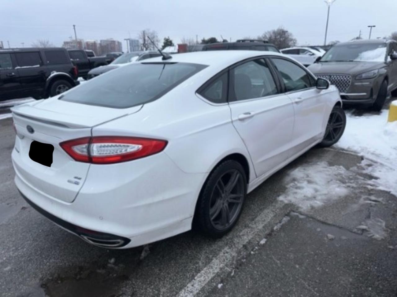 2015 Ford Fusion 201A | INCOMING | PREMIUM FRONT/REAR FLOOR MATS W/TRUNK MAT | SE MYFORD TOUCH TECHNOLOGY PKG | HEATED SEATS | CHARCOAL BLACK ECO CLOTH FRONT BKT STS Photo