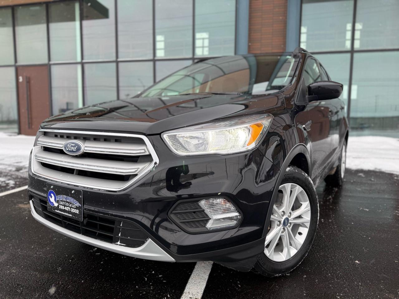 <p dir=ltr>Marlin Motors Limited</p><p dir=ltr>OMVIC & UCDA Registered</p><p dir=ltr>135 Cushman Rd, St Catharines ON</p><p><strong>&nbsp;</strong></p><p dir=ltr>*2019 Ford Escape SE AWD*</p><p><strong>&nbsp;</strong></p><p dir=ltr>Nice sporty all wheel drive SUV! Loaded with great options and lots of space.</p><p><strong>&nbsp;</strong></p><p dir=ltr>-All Wheel Drive</p><p dir=ltr>-Leather Seats</p><p dir=ltr>-Push Button Start</p><p dir=ltr>-Heated Seats</p><p dir=ltr>-Remote Start</p><p><strong><br><br></strong></p><p dir=ltr>Just serviced! Including new brakes, fresh oil change, air filters & complete detail.</p><p><strong><br><br></strong></p><p dir=ltr>$12,999 + HST/Licensing</p><p dir=ltr>Price Includes Safety & Carfax&nbsp;</p><p><strong>&nbsp;</strong></p><p dir=ltr>Financing & Warranties Available!</p><p dir=ltr>Fill out an application on our website below</p><p dir=ltr>Visit our website - <a href=http://marlinmotorsltd.com>marlinmotorsltd.com</a>&nbsp;</p><p><strong>&nbsp;</strong></p><p dir=ltr>*PLEASE NOTE WE OPERATE BY APPOINTMENT ONLY - CALL OR TEXT 289-407-3002 ANYTIME TO SCHEDULE AN APPOINTMENT*</p><p>&nbsp;</p>
