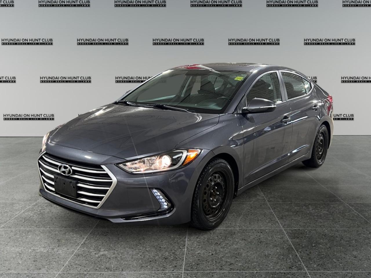 * $17,999 Cash * $15,888 Finance The 2018 Hyundai Elantra GL SE in a crisp White finish with front-wheel drive offers a balanced mix of comfort and agility for urban and highway driving. This sedan is expertly crafted to deliver a smooth and reliable driving experience with automatic handling that ensures easy navigation. On the outside, the Elantra stands out with its stylish alloy wheels and sleek, aerodynamic lines. Inside, the warm embrace of heated front seats, accompanied by a luxurious leather steering wheel, brings superior comfort. Key features such as a power sunroof provide a lux touch, while the convenient power windows and keyless entry enhance everyday functionality. Technological innovation is seamlessly integrated with a user-friendly interface that supports Bluetooth connectivity and smart device integration, ensuring you stay connected on the go. Safety is prioritized with features like a backup camera, lane assist, and brake assist to support a secure driving experience. If youre looking for a reliable sedan that offers a blend of style, technology, and safety, the Hyundai Elantra GL SE is an outstanding choice. Reach out to our dealership today for more information and to schedule a test drive. Experience the perfect harmony of comfort and innovationcontact us now! **ADVERTISED PRICE IS FOR FINANCE DEALS ONLY, CASH PRICE MAY BE SUBJECT TO INCREASE. SEE DEALER FOR DETAILS**