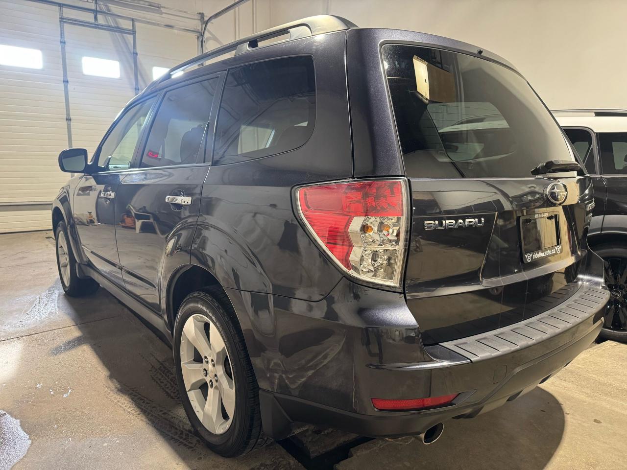 2010 Subaru Forester X Touring Photo