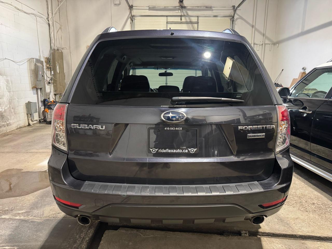 2010 Subaru Forester X Touring Photo