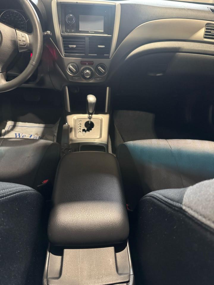 2010 Subaru Forester X Touring Photo