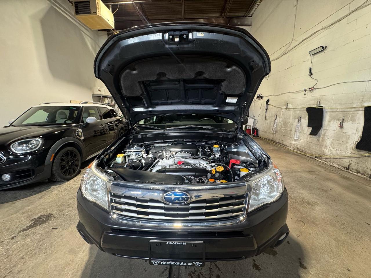 2010 Subaru Forester X Touring Photo