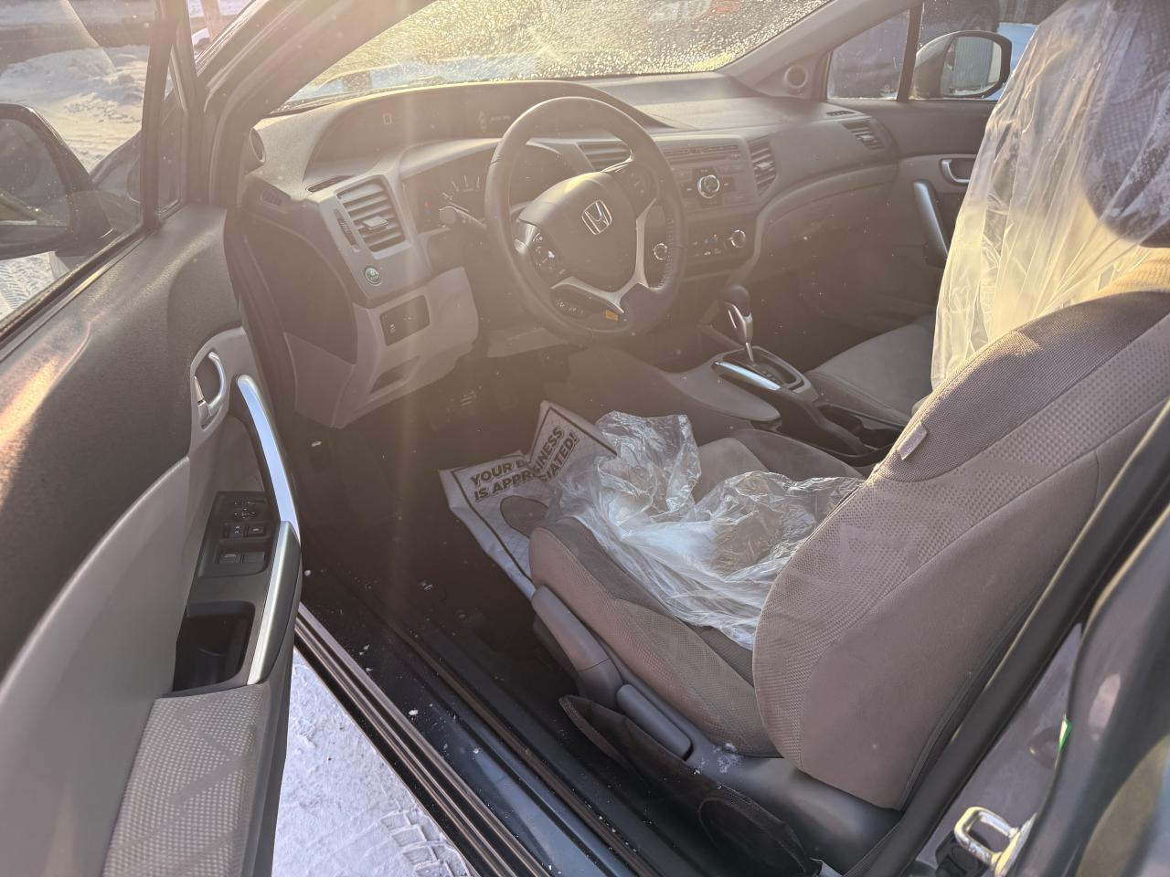 2012 Honda Civic 2dr Auto EX Photo