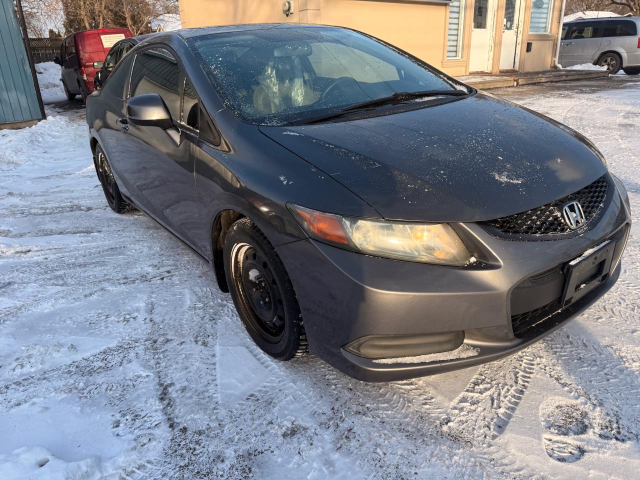 2012 Honda Civic 2dr Auto EX Photo