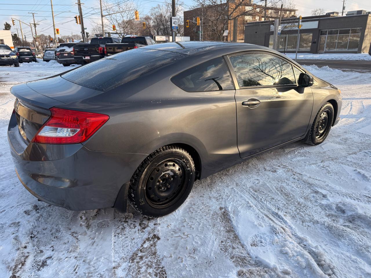 2012 Honda Civic 2dr Auto EX Photo