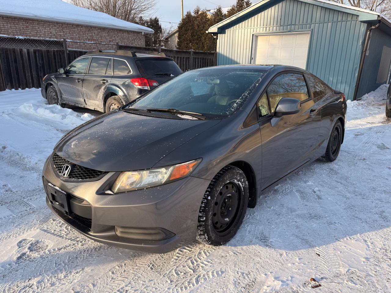 2012 Honda Civic 2dr Auto EX Photo