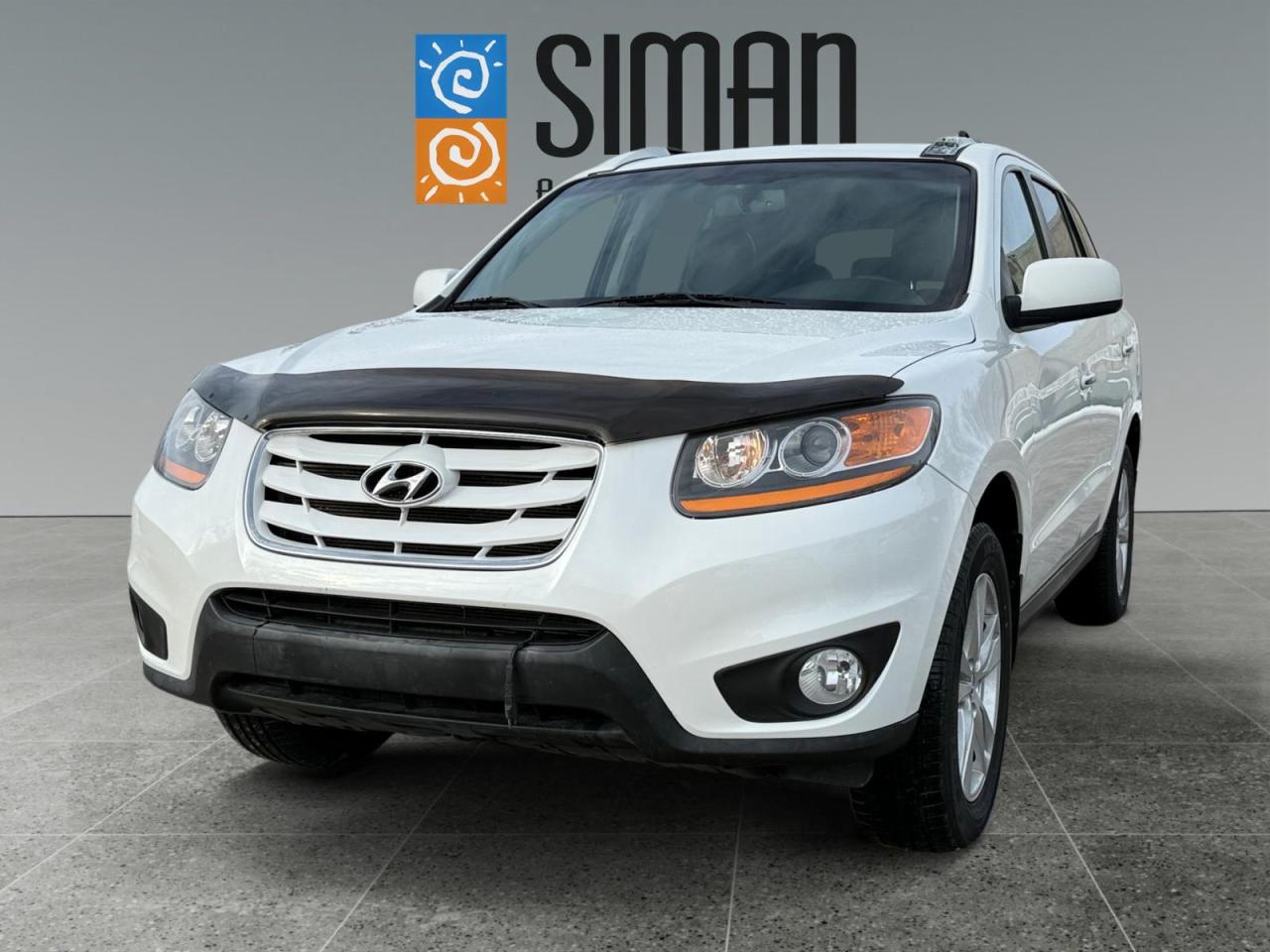 ## **Welcome to Your Next Adventure: 2010 Hyundai Santa Fe Limited**

Experience the perfect blend of reliability, comfort, and value. At **Siman Auto Sales**, we are proud to present this exceptional 2010 Hyundai Santa Fe Limited. This isnt just another SUV; it is a meticulously maintained, Saskatchewan-local vehicle ready for the road ahead.

---

### **Premium Comfort and Features**

Step inside the Limited trim and enjoy a driving experience designed around your comfort. Whether you are commuting in the city or heading out on a highway road trip, this Santa Fe delivers:

* **Power Heated Leather Seating:** Stay warm during Saskatchewan winters with premium, adjustable leather seats.
* **Sunroof:** Open up the cabin to enjoy fresh air and natural light.
* **HomeLink System:** Integrated garage door openers for your convenience and security.
* **Entertainment:** Equipped with a CD player and SiriusXM radio capability to keep your favorite music playing.
* **Style:** Finished with sleek alloy wheels that complement its timeless design.

---

### **Total Peace of Mind**

We believe in transparency and quality. You can drive away with confidence knowing exactly what you are getting:

* **Clean History:** Carfax reports this as a Saskatchewan vehicle with an excellent service history.
* **New Tires:** Brand new tires installed all around for maximum traction and safety.
* **New Brakes:** Fresh brakes installed at all four corners for reliable stopping power.
* **Fresh Service:** Includes a fresh full synthetic oil service.
* **Rigorous Inspection:** Every vehicle undergoes a comprehensive presale inspection before hitting our lot.

---

### **Flexible Options for Every Buyer**

We make the buying process easy and stress-free:

* **Trades Encouraged:** We want your current vehicle! Bring it in for a fair and competitive appraisal.
* **Custom Warranties:** We offer a variety of aftermarket warranties designed to fit every need and budget, ensuring you stay protected long after you leave the lot.

---

### **Why Choose Siman Auto Sales?**

We have been proudly serving Saskatchewan for over **27 years**. Our philosophy is simple: we are large enough to make a difference and small enough to care.

With over **70 vehicles** to choose from and a reputation built on trust, we invite you to check our reviews and see why our customers keep coming back.

**Visit us today and take this Santa Fe for a test drive!**