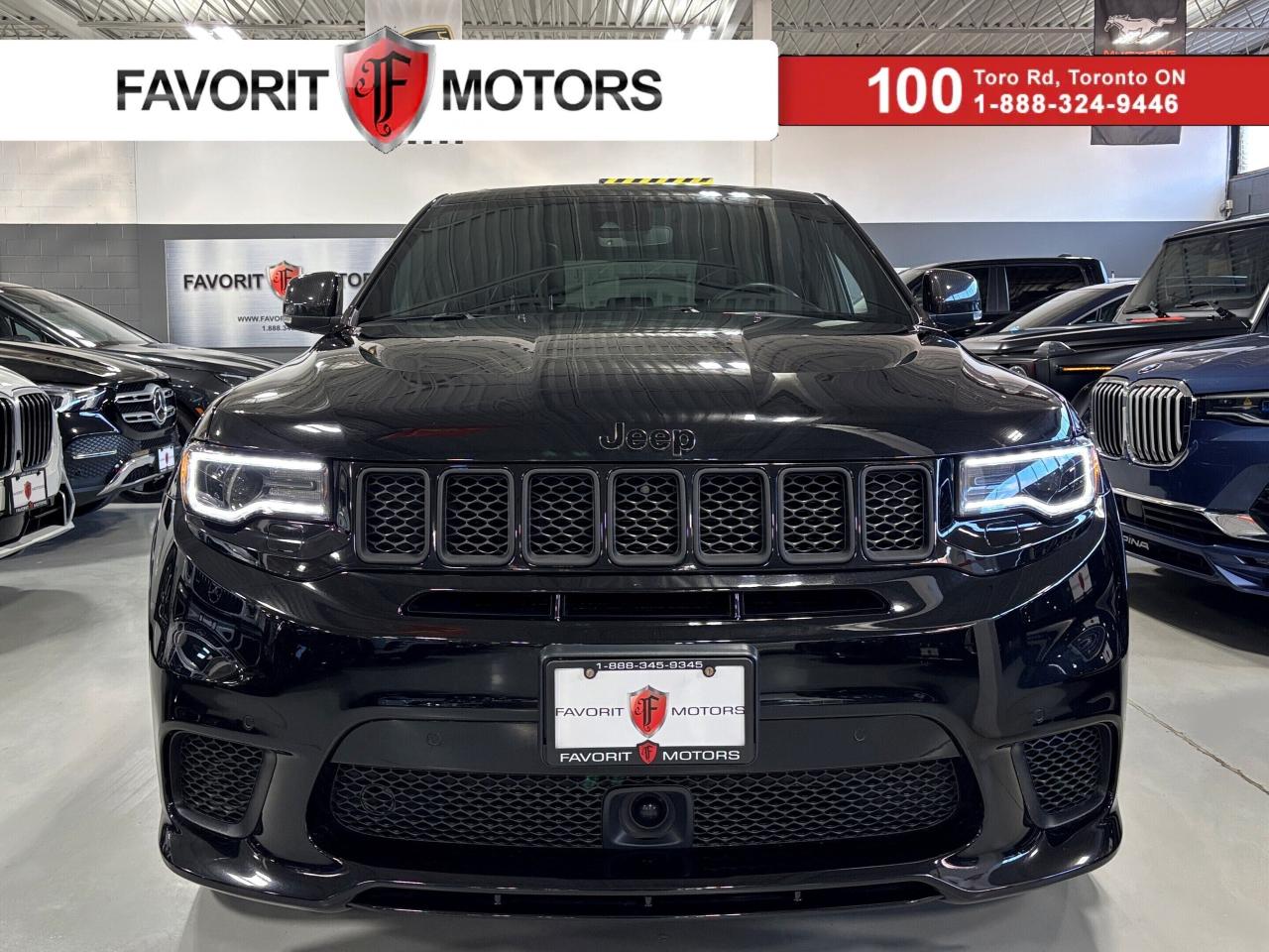 **MONTH-END SPECIAL!** - - > | NO LUXURY TAX | < - - FEATURING : 707 HORSEPOWER SUPERCHARGED V8 HEMI, 4X4, YELLOW CALIPER BREMBO BRAKES, CARBON MIRROR CAPS, CARBON INTERIOR TRIMS, MUDFLAPS, MULTI DRIVE AND TERRAIN MODES, TRACK MODE, PERFORMANCE PAGES, PERFORMANCE DISPLAYS, LAUNCH CONTROL, REMOTE START, REMOTE TRUNK, HIGHLY EQUIPPED, VERY CLEAN! FINISHED IN BLACK ON MATCHING BLACK INTERIOR, TRACKHAWK STITCHED LEATHER AND SUEDE SEATS, HEATED/COOLED SEATS, REAR HEATED SEATS, HEATED STEERING WHEEL, HEATED MIRRORS, NAVIGATION SYSTEM, BACKUP CAMERA, PARKING SENSORS, AUTOMATIC EMERGENCY BRAKING, LANESENSE, BLIND SPOT ALERT, AM, FM, SATELLITE, USB, AUX, BLUETOOTH, PREMIUM ALLOYS, STEERING WHEEL CONTROLS, PREMIUM HARMAN/KARDON SOUND SYSTEM, POWER OPTIONS, POWER TRUNK, PANORAMIC ROOF, WEATHERPROOF FLOORMATS, AND MUCH MORE!!!


**As per OMVIC regulations, this vehicle is not drivable, not certified and not e-tested. Certification is available for $899.** All our vehicles are in excellent condition and have been fully inspected by an in-house licensed mechanic.


The advertised price is a finance only price, if you wish to purchase the vehicle for cash additional $2,000 surcharge will apply. Applicable prices and special offers are subject to change with or without notice and shall be at the full discretion of Favorit Motors.