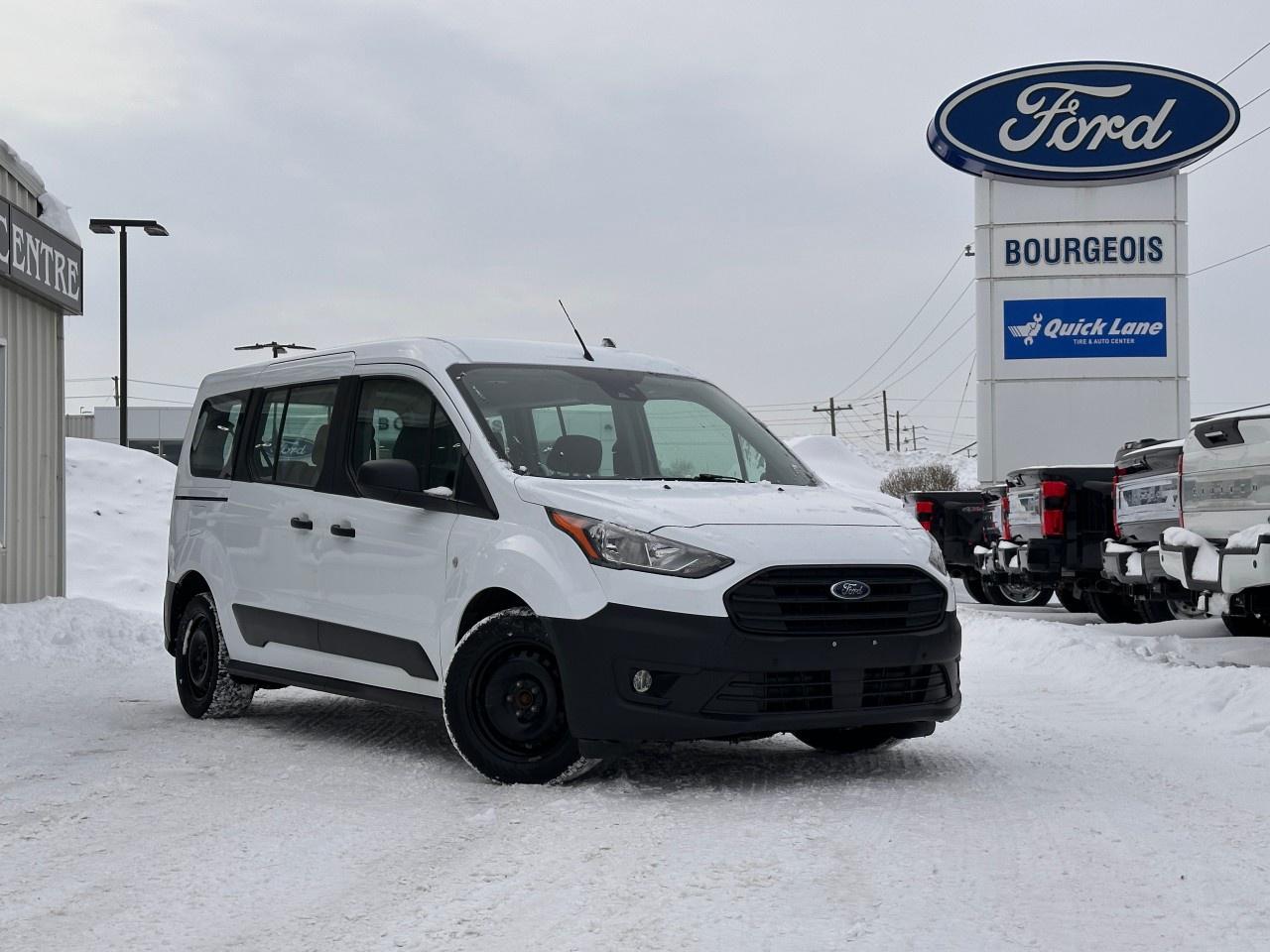 <p>The 2022 Ford Transit Connect Wagon XL w/Dual Sliding Doors & Rear Liftgate impresses with its versatile handling and efficient Front-Wheel Drive system. This spacious van, presented in a classic White exterior, promises both functionality and style for every journey.</p><p>Designed with practicality in mind, the Ford Transit Connect Wagon's sleek profile is complemented by dual sliding doors, ensuring easy access for passengers and cargo alike. Inside, the cabin features a refined Black interior, offering comfort through well-designed seating and an intuitive layout.</p><p>Equipped with the latest in-vehicle technology, this XL model features Bluetooth connectivity and smart device integration, keeping you connected while on the road. Safety is a priority, with a backup camera, brake assist, and parking sensors enhancing driver confidence and peace of mind.</p><p>This vehicle is ideal for families or businesses seeking a reliable and accommodating van. Don't miss the opportunity to explore all the benefits of the 2022 Ford Transit Connect Wagon. Contact our dealership today to learn more or to schedule a test drive.</p>