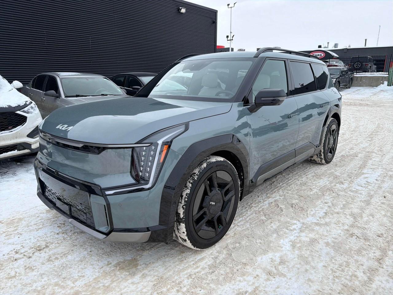 <p><strong>This used 2024 Kia EV9 Land with the GT-Line Package</strong> delivers a bold blend of luxury, performance, and cutting-edge electric technology in one of the most advanced three-row EV SUVs on the market. <strong>This used 2024 Kia EV9 </strong><span style=color:rgb( 0 , 0 , 0 )>is available now at </span><strong>Abbotsford Hyundai</strong><span style=color:rgb( 0 , 0 , 0 )>, your trusted dealership in </span><strong>Abbotsford, British Columbia</strong><span style=color:rgb( 0 , 0 , 0 )>.</span></p><p> The Land trim already offers a premium foundation, and the GT-Line Package elevates it with exclusive styling, enhanced capability, and a more dynamic driving experience. Its dual-motor all-wheel-drive system provides strong, confident acceleration, while fast-charging capability and an impressive driving range make it practical for both daily commuting and long-distance travel. Inside, the EV9 surrounds passengers with a modern, upscale cabin featuring heated and ventilated seats, a panoramic dual-screen display, premium audio, and Kias latest driver-assistance technologies. </p><p>The GT-Line Package adds distinctive exterior accents, unique wheels, upgraded lighting, and sport-inspired interior touches that set it apart from the rest of the lineup. With its spacious three-row layout, advanced safety suite, and futuristic design, the 2024 Kia EV9 Land with GT-Line Package is an exceptional choice for families and EV enthusiasts seeking style, comfort, and innovation in a fully electric SUV. <span style=color:rgb( 0 , 0 , 0 )>This vehicle has undergone a </span><strong>comprehensive multi-point inspection</strong><span style=color:rgb( 0 , 0 , 0 )>by our certified technicians. Ask us about </span><strong>extended warranty options</strong><span style=color:rgb( 0 , 0 , 0 )>, </span><strong>vehicle history reports</strong><span style=color:rgb( 0 , 0 , 0 )>, and </span><strong>flexible financing plans</strong><span style=color:rgb( 0 , 0 , 0 )>tailored to your needs.</span></p> <p>All Abbotsford Hyundai pre-owned vehicles come complete with the remaining Manufacturers Warranty plus a vehicle safety report and a CarFax history report. Abbotsford Hyundai is a BBB accredited pre-owned car dealership, serving the Fraser Valley and our friends in Surrey, Langley and surrounding Lower Mainland areas. We are your Friendly Fraser Valley car dealer. We are located at 30250 Automall Drive in Abbotsford. Call or email us to schedule a test drive.</p><p>*All Sales are subject to Taxes, $799 Doc fee, $87 Fuel Surcharge and up to $1,299 Hyundai Certified Fee for CPO vehicles. Advertised price is finance price, cash price may differ. Refer to dealer website for most up to date information.</p>