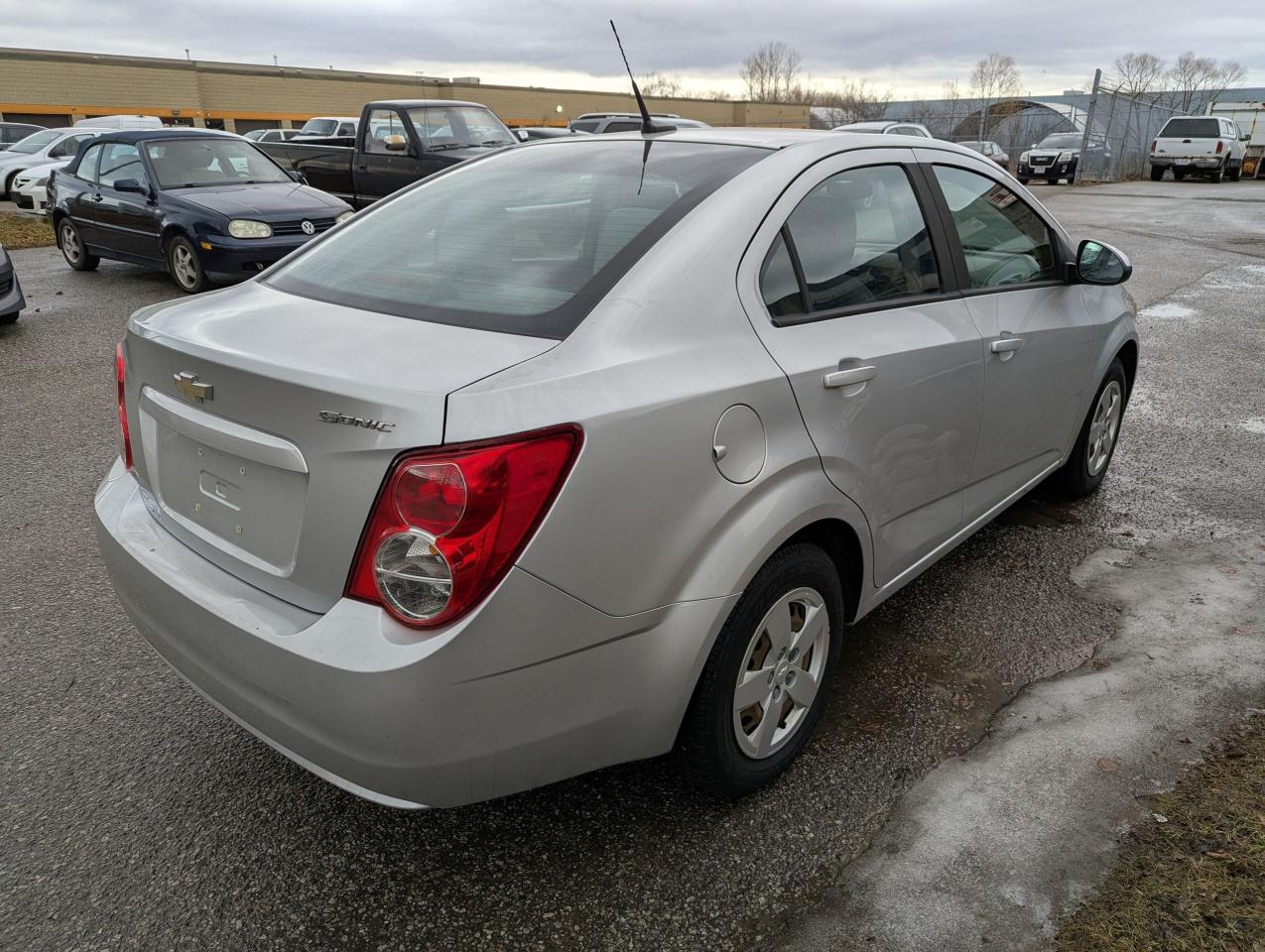 2012 Chevrolet Sonic "Gas MISER" certified + FREE 6M warranty Photo