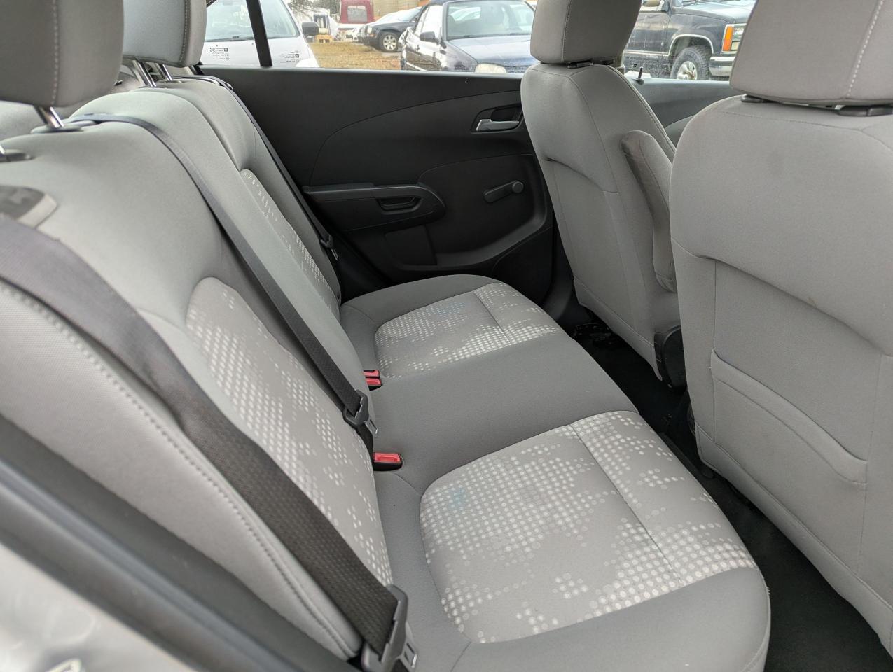 2012 Chevrolet Sonic "Gas MISER" certified + FREE 6M warranty Photo