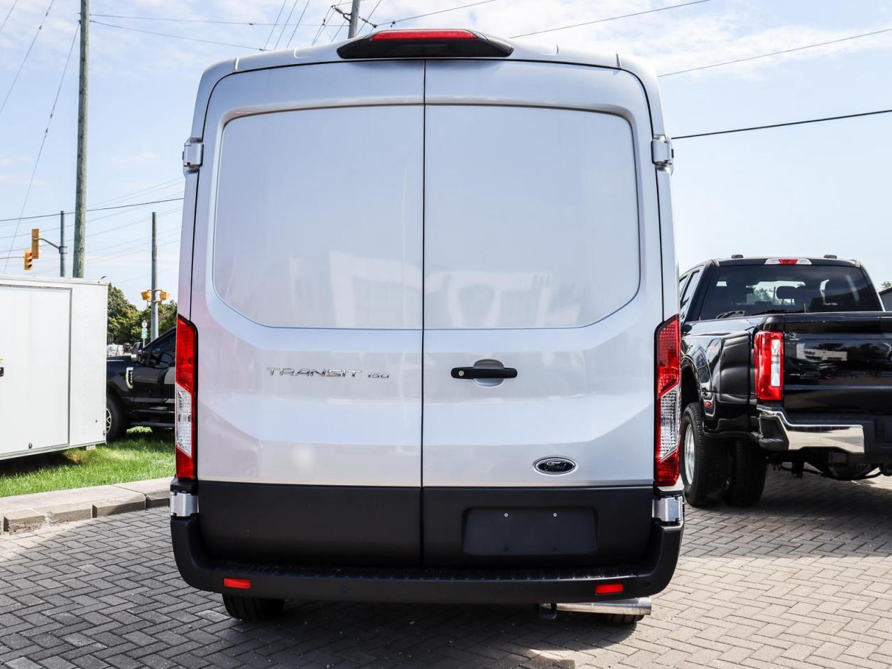 2023 Ford Transit-150 Cargo Base Rear-Wheel Drive Medium Roof Van 148 in. WB Photo