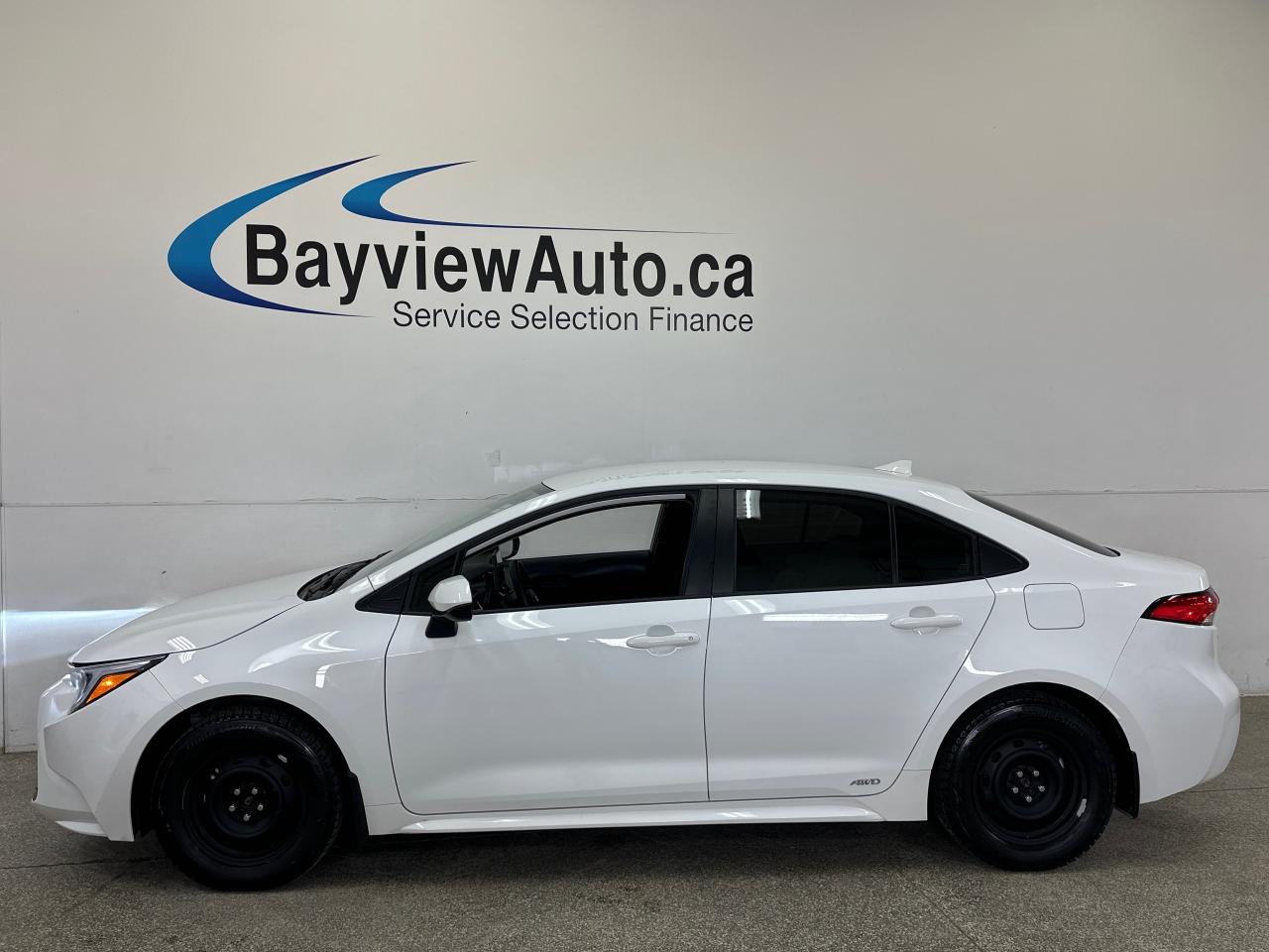 2026 Toyota Corolla Hybrid LE 4dr All-Wheel Drive Sedan Photo3