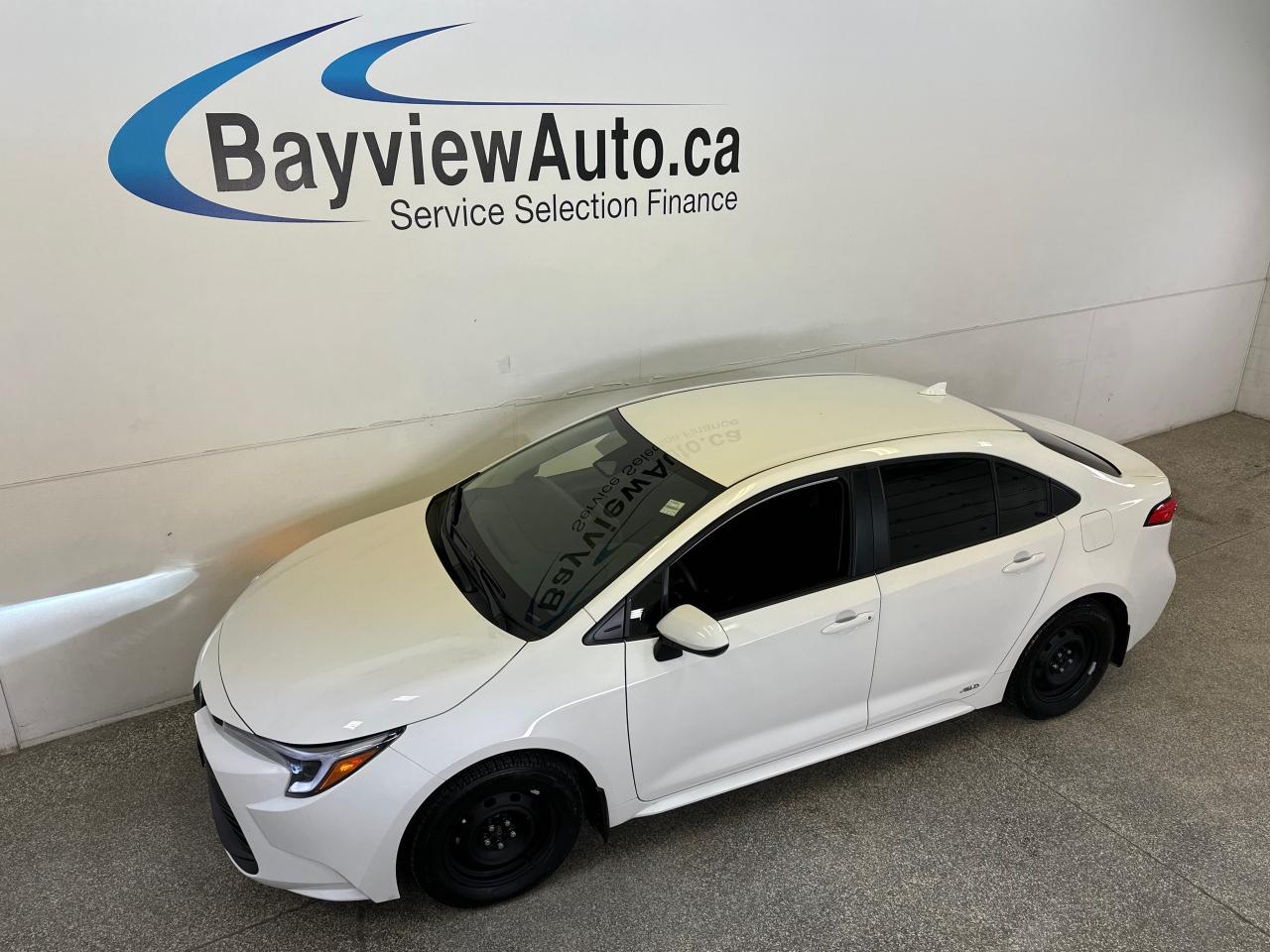 2026 Toyota Corolla Hybrid LE 4dr All-Wheel Drive Sedan Photo0