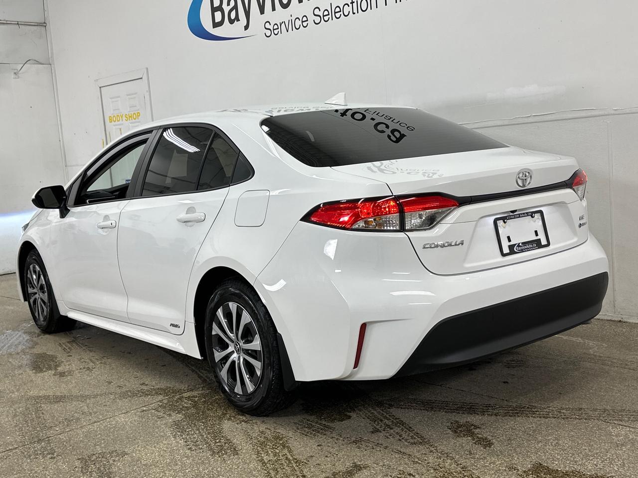 2026 Toyota Corolla Hybrid LE 4dr All-Wheel Drive Sedan Photo4