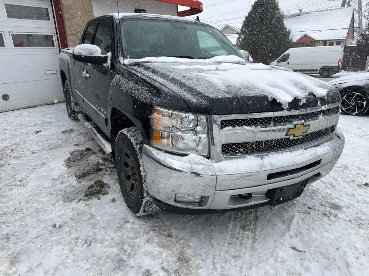 2013 Chevrolet Silverado 1500 4WD Ext Cab 143.5" LT Photo