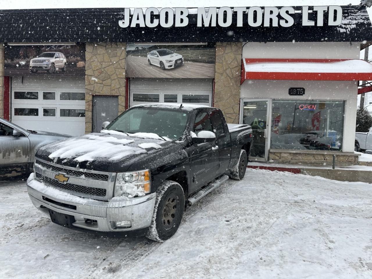 2013 Chevrolet Silverado 1500 4WD Ext Cab 143.5" LT Photo