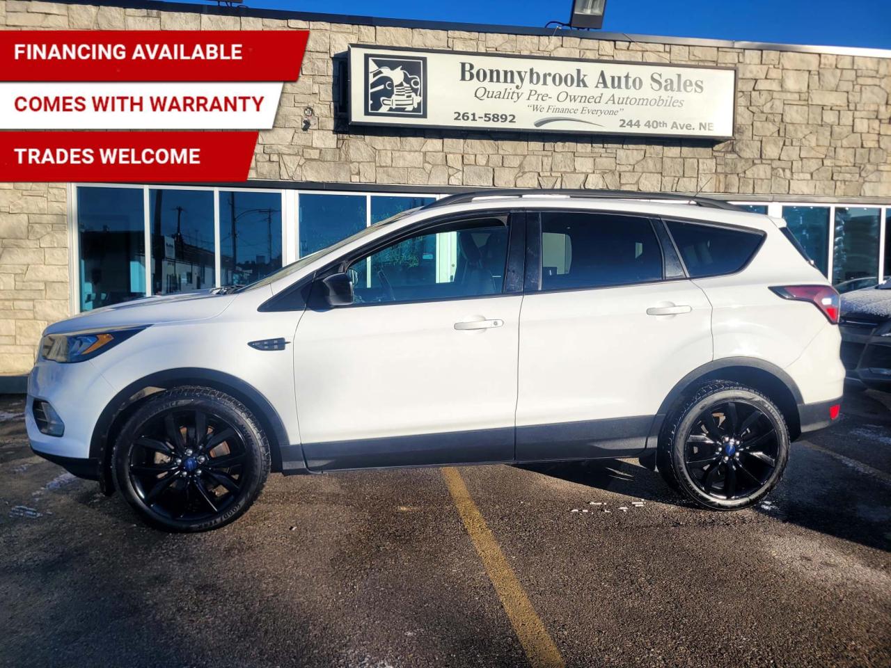 Need a vehicle that has style? Look at our Pre-Owned 2018 FORD ESCAPE SE 4X4 (Pictured in photo) Options including: Heated  Seats, Keyless Entry, Bluetooth,  Power Mirrors, Power Locks, Panoramic sunroof Rearview camera, Power seat, Car Starter Power Windows. Am/Fm stereo Cd player Air /Tilt /Cruise/  Comes with 6 month power train warranty with options to extend. Smooth ride at a great price thats ready for your test drive. Fully inspected and given a clean bill of health by our technicians. Fully detailed on interior and exterior so it feels like new to you. There should never be any surprises when buying a used car, thats why we share our Mechanical Fitness Assessment and Carfax with our customers, so you know what we know. Bonnybrook Auto sales is helping thousands find quality used vehicles at prices they can afford. If you would like to book a test drive, have questions about a vehicle or need information on finance rates, give our friendly staff a call today! Bonnybrook auto sales is proudly one of the few car dealerships that have been serving Calgary for over Twenty years. /TRADE INS WELCOMED/ Amvic Licensed Business.  Due to the recent increase for used vehicles.  We are in need of pre-owned vehicles. We give top dollar for your trades.  We also purchase all makes and models of vehicles.