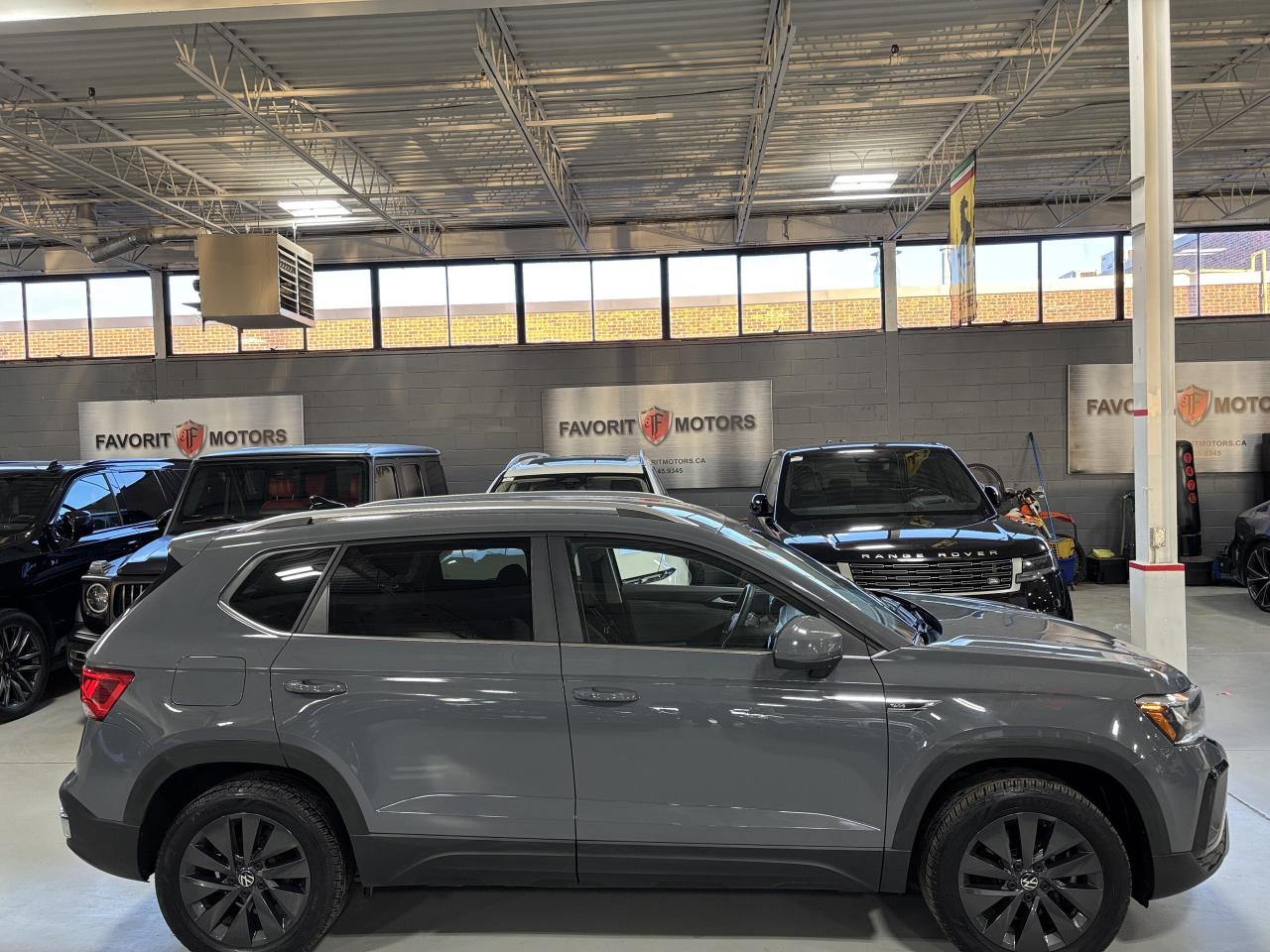 2024 Volkswagen Taos Comfortline|ALLOYS|LEATHER|SUEDE|CARPLAY|HEATSEATS Photo