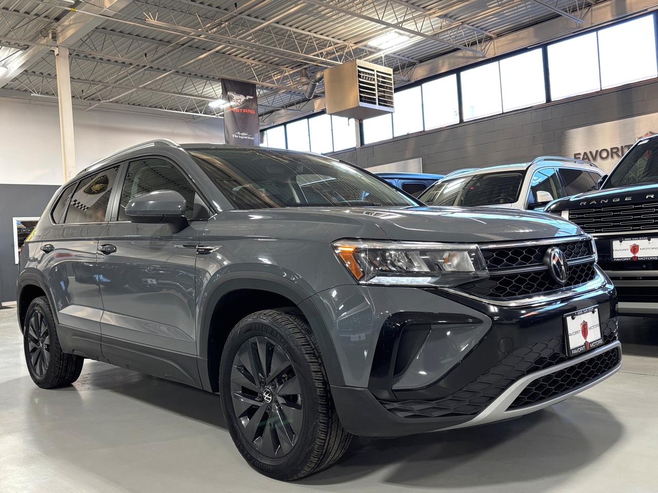 2024 Volkswagen Taos Comfortline|ALLOYS|LEATHER|SUEDE|CARPLAY|HEATSEATS Photo