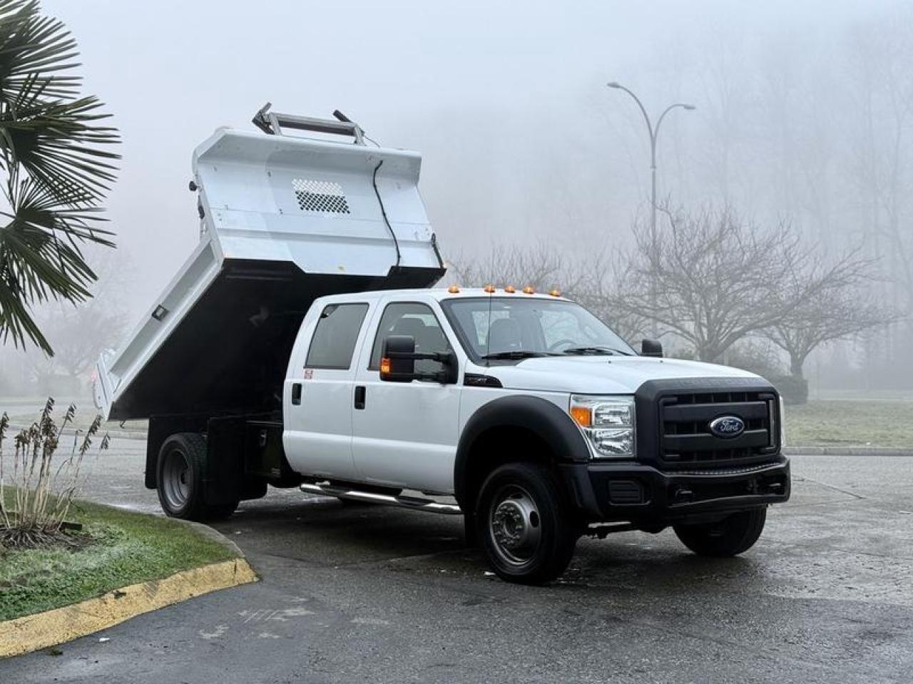 Used 2012 Ford F-550 XL Super Duty 4x4 9-Foot Dump Truck for sale in Burnaby, BC