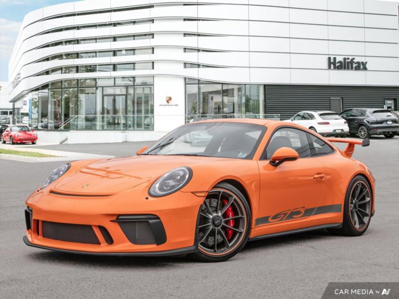 *Porsche of Halifax: 2018 Porsche 911 GT3 -- Manual Precision, Track-Bred Passion*Finished in *(Paint to Sample) Pastel Orange* with a *Black leather interior*, this *2018 Porsche 911 GT3* is a true collectors car---raw, engaging, and built for purists. Equipped with a 6-speed GT Sport manual transmission, full bucket seats, and motorsport-derived components, this GT3 embodies the essence of the Porsche performance legacy.*Performance and Engineering*  *   Powered by a *500 hp naturally aspirated 4.0L flat-six*, paired with a *6-speed GT Sport manual transmission* for a visceral and connected drive.  *   Features the *Front Axle Lift System*, *Extended Range 90-litre Fuel Tank*, and *Chrono Package with Lap Trigger Prep*---ideal for spirited road drives or precision days at the track.*Design and Custom Touches*  *   Standout *Paint to Sample Pastel Orange* finish paired with *Platinum Satin Wheels* offers an unmistakable look.  *   Fitted with *LED Headlights in Black with PDLS Plus*, *Carbon Fiber Interior Trim*, *Illuminated Carbon Fiber Door Sills*, and *Alcantara® accents* for a purposeful, motorsport-inspired cabin.  *   Interior enhancements include *instrument dials and Sport Chrono clock in White*, *personalized floor mats*, *contrast stitching*, and *leather-wrapped steering column*.*Comfort and Convenience*  *   Includes *BOSE® Surround Sound System*, *HomeLink®*, *Luggage Net*, and *Smoking Package*.  *   Practical touches like the *Fire Extinguisher*, *Storage Lid with Porsche Crest*, and *Sun Visors in Alcantara®* add function to the form.With only *8,617 km*, one previous owner, and a meticulous option list, this GT3 is a rare opportunity for enthusiasts seeking manual thrills and long-term value.*Included with this Porsche CPO Program Vehicle:*  * *2 years of unlimited-kilometer Porsche Approved Warranty coverage starting the day you take Delivery.*  * *A 111-Point Inspection performed by Porsche-trained technicians, reconditioned using only genuine Porsche Parts.*  * *For the duration of the Warranty period, 24-hour Porsche Roadside Assistance, including towing, emergency fuel delivery, lock out service, trip interruption coverage, and more.****This vehicle is being kept off-site. Please inquire with a Sales Executive to arrange a private viewing.***