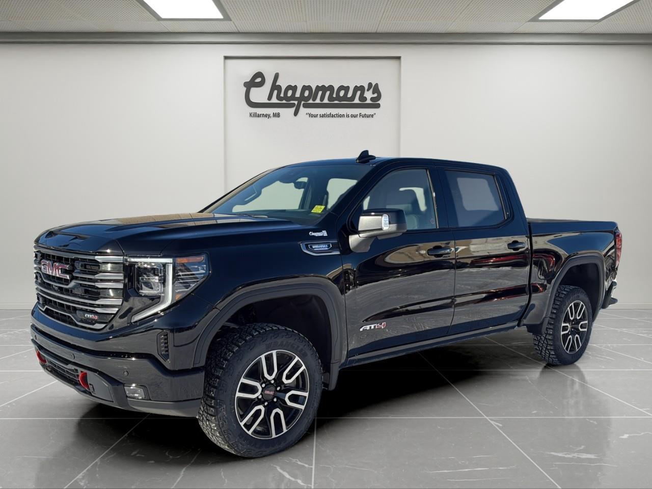 <p>The 2026 GMC Sierra 1500 AT4 Crew Cab 4WD combines serious off-road capability with premium refinement and advanced diesel performance. Finished in <strong>Onyx Black</strong> with a <strong>Jet Black and Kalahari interior</strong>, this AT4 is powered by the <strong>Duramax 3.0L Turbo-Diesel</strong> and equipped with the AT4 Premium and Technology Packages, making it a highly capable and well-appointed full-size pickup.</p><p><strong>Performance & Capability</strong></p><p>Built to handle demanding terrain, towing, and long-distance driving with confidence.</p><ul><li><p>Duramax 3.0L Turbo-Diesel Engine</p></li><li><p>10-Speed Automatic Transmission</p></li><li><p>4WD with 2-Speed Autotrac Transfer Case</p></li><li><p>Automatic Locking Rear Differential</p></li><li><p>AT4 Off-Road Suspension with 2" Lift and Monotube Shocks</p></li><li><p>Skid Plates</p></li><li><p>Hill Descent Control</p></li><li><p>Trailer Brake Controller</p></li><li><p>In-Vehicle Trailering App</p></li><li><p>120V AC Power Outlets (Instrument Panel and Cargo Bed)</p></li></ul><p><strong>Interior Comfort & Convenience</strong></p><p>A premium AT4 cabin designed for comfort on long drives and rough terrain.</p><ul><li><p>Heated and Ventilated Front Bucket Seats</p></li><li><p>Heated Second-Row Outboard Seats</p></li><li><p>10-Way Power Front Seats</p></li><li><p>Driver Seat and Mirror Memory</p></li><li><p>Heated Leather-Wrapped Steering Wheel</p></li><li><p>Power Tilt and Telescoping Steering Column</p></li><li><p>Adaptive Cruise Control</p></li><li><p>Wireless Charging</p></li><li><p>Bose Premium Sound System</p></li><li><p>Premium Floor Liners</p></li></ul><p><strong>Technology & Connectivity</strong></p><p>Advanced displays and trailering technology keep you connected and informed.</p><ul><li><p>GMC Premium Infotainment System</p></li><li><p>13.4" Diagonal Colour Touchscreen</p></li><li><p>Google Built-In with Navigation Capability</p></li><li><p>Wireless Apple CarPlay</p></li><li><p>Wireless Android Auto</p></li><li><p>12.3" Digital Driver Information Centre</p></li><li><p>OnStar Basics (Up to 8 Years)</p></li><li><p>SiriusXM Audio (Trial Included)</p></li><li><p>Keyless Open and Remote Start</p></li><li><p>Head-Up Display</p></li><li><p>Rear Camera Mirror</p></li><li><p>Bed View Camera</p></li></ul><p><strong>Safety & Driver Assistance</strong></p><p>A comprehensive suite of driver-assist technologies designed to support confidence on and off the road.</p><ul><li><p>GMC Pro Safety</p></li><li><p>Automatic Emergency Braking</p></li><li><p>Forward Collision Alert</p></li><li><p>Front Pedestrian Braking</p></li><li><p>Lane Keep Assist with Lane Departure Warning</p></li><li><p>Following Distance Indicator</p></li><li><p>IntelliBeam Automatic High Beams</p></li><li><p>Front and Rear Park Assist</p></li><li><p>Trailer Side Blind Zone Alert</p></li><li><p>Rear Cross Traffic Braking</p></li><li><p>Rear Pedestrian Alert</p></li><li><p>Safety Alert Seat</p></li><li><p>HD Surround Vision</p></li><li><p>Tire Pressure Monitoring with Tire Fill Alert</p></li><li><p>Teen Driver Technology</p></li></ul><p><strong>Exterior Highlights</strong></p><p>Bold AT4 styling paired with functional, trail-ready design elements.</p><ul><li><p>20" Machined Aluminum Wheels with Carbon Grey Accents</p></li><li><p>Goodyear Wrangler Territory MT Tires</p></li><li><p>Spray-On Bedliner</p></li><li><p>GMC MultiPro Tailgate</p></li><li><p>LED Cargo Area Lighting</p></li><li><p>Power Folding Heated Mirrors with Driver-Side Auto-Dimming</p></li><li><p>LED Headlamps, Tail Lamps, and Fog Lamps</p></li><li><p>Rain-Sensing Wipers</p></li><li><p>Rear Window Defogger</p></li><li><p>Power Sunroof</p></li><li><p>Off-Road High-Clearance Steps</p></li></ul><p>2 Year/24,000 kilometer* Complimentary Oil Changes (2 total)</p><p>3 Year/60,000 kilometer* Base Warranty Coverage</p><p>5 Year/100,000 kilometer* Powertrain Component Warranty Coverage</p><p>5 Year/100,000 kilometer* Courtesy Transportation and 24/7 Roadside Assistance</p><p>6 Year/160,000 kilometer* Sheet Metal (Rust Through) Perforation Warranty Coverage</p><p>*Whichever Comes First.</p><p>Price Includes Dealer Fee.</p><p>Price Excludes PST & GST.</p><p>Financing Options Available, Call For More Details.</p> <p><strong>*While every reasonable effort is made to ensure the accuracy of this information, we are not responsible for any error or omissions contained on these pages. Please verify any information in question with Chapman Motors Ltd.</strong></p>