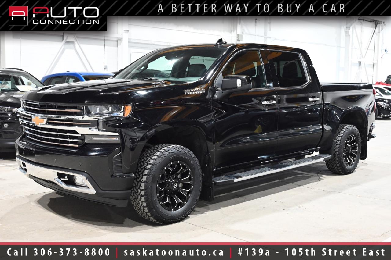 <p><span></span><font color=#000000><span><span>Financing & Warranty Available!</span><span><br></span></span></font><span><br></span><span></span><span>Crew Cab w/ 5.8ft. Box - 3.0L Duramax Turbo-Diesel - SK Truck</span><span><br></span><span><br>This <b>2021 Chevrolet Silverado 1500 High Country</b> is the definition of premium truck ownership, finished in sleek Black with a striking Jet Black and Umber perforated leather interior that immediately sets it apart. Under the hood, the powerful and efficient 3.0L Duramax turbo-diesel delivers an impressive 460 lb-ft of torque through a smooth 10-speed automatic transmission, giving you confident acceleration and serious capability for work or recreation. With advanced 4x4, off-road suspension, and an automatic locking rear differential, this Silverado is built to handle challenging terrain while maintaining the refined ride High Country owners expect. When it is time to tow, the 9,000 lb. capacity, integrated trailer brake controller, hitch guidance with hitch view, and Advanced Trailering Package provide stability and control that make hauling feel effortless. Step inside and you are greeted by a luxury-grade cabin featuring heated and ventilated front seats, heated rear seats, a power moonroof, wireless charging, and a Bose premium sound system that transforms every drive into a first-class experience. The Chevrolet Infotainment 3 Premium system with navigation, Apple CarPlay and Android Auto, enhanced voice recognition, and a configurable 8-inch driver display keeps you seamlessly connected and informed. Confidence comes standard with adaptive cruise control, lane keep assist, blind zone monitoring, rear cross traffic alert, automatic emergency braking, and forward collision alert working together to support you on the road. Daily convenience is elevated with remote start, power-folding heated memory mirrors, front and rear park assist, and an HD rear vision camera that simplify tight parking and busy job sites. Riding on bold 20-inch machined aluminum wheels and protected by a factory spray-in bedliner, this High Country delivers a rare combination of upscale comfort, rugged capability, and commanding road presence.<br><br></span><span></span><span>Key Features:</span><span><br></span><span><br>- 4x4<br>- Safety Package II<br>- Z71 Off-Road Package<br>- Cooled & Heated Front Seats<br>- Heated Rear Seats<br>- Heated Steering Wheel<br>- Remote Start<br>- Adaptive Cruise Control<br>- Apple CarPlay & Android Auto Compatibility<br>- Wireless Charging<br>- Navigation<br>- Power Moonroof<br>- 7-Speaker Bose Premium Sound System w/ Richbass Subwoofer<br>- Front & Rear Park Assist<br>- HD Rear Vision Camera<br>- Lane Keep Assist w/ Lane Departure Warning<br>- Lane Change Alert w/ Side Blind Zone Alert<br>- Rear Cross Traffic Alert<br>- Following Distance Indicator<br>- Safety Alert Seat<br>- Automatic Emergency Braking<br>- Front Pedestrian Braking<br>- Forward Collision Alert<br>- IntelliBeam Automatic High Beams<br>- Chevrolet Infotainment 3 Premium System w/ 8-Inch HD Touchscreen<br>- Enhanced Driver Information Center w/ 8-Inch Configurable Display<br>- Enhanced Voice Recognition<br>- Power-Folding Heated Side Mirrors w/ Memory<br>- Chevytec Spray-On Bedliner<br>- 20-Inch Painted-Aluminum Wheels w/ Machined Face & Light Argent Pockets<br>- Advanced Trailering Package<br>- Integrated Trailer Brake Controller<br>- Hitch Guidance w/ Hitch View<br>- Fifth-Wheel Hitch<br>- 9,000lb Towing Capacity<br>- Off-Road Suspension<br>- Automatic Locking Rear Differential<br>- 10-Speed Automatic Transmission<br>- 3.0L Duramax 6-Cylinder Turbo-Diesel Engine (277HP & 460lb-ft. of Torque)<br><br><b>Exterior Colour:</b> Black<br><b>Interior Colour:</b> Jet Black/Umber Perforated Leather<br><br><b>Manufacturers Brochure:</b> </span><a href=https://cdn.dealereprocess.org/cdn/brochures/chevrolet/2021-silverado1500.pdf target=_blank><span>https://cdn.dealereprocess.org/cdn/brochures/chevrolet/2021-silverado1500.pdf</span></a><span><br><br></span><span>Unlock a full year of exclusive VIP benefits with your purchase! Enjoy 20% off labour, 25% off tires, free windshield stone chip repairs, and so much more. Visit saskatoonauto.ca for all the details.<br></span><span><br>Honesty Pricing eliminates the haggle hassle by providing you with our lowest possible selling price up front. In fact, it is the lowest price in our market, and we will prove it by disclosing a comprehensive market report of what our competitors are selling similar vehicles for.<br></span><span><br>This vehicle meets our Diamond Certification standard, which begins by selecting only premium quality vehicles and subjecting them to a much more comprehensive inspection process than typical dealerships use. Diamond Certified ensures a clean history, exceptional appearance and problem-free operation.<br></span><span><br>At Saskatoon Auto Connection we sell pre-owned automobiles the way we would like to buy them ourselves. Since 2008, we have been dedicated to providing the highest level of integrity and transparency in our industry, in combination with the highest quality vehicles at the most competitive prices in Saskatchewan. Our friendly staff is ready to positively redefine your expectations of the pre-owned automobile space.</span><span></span></p>