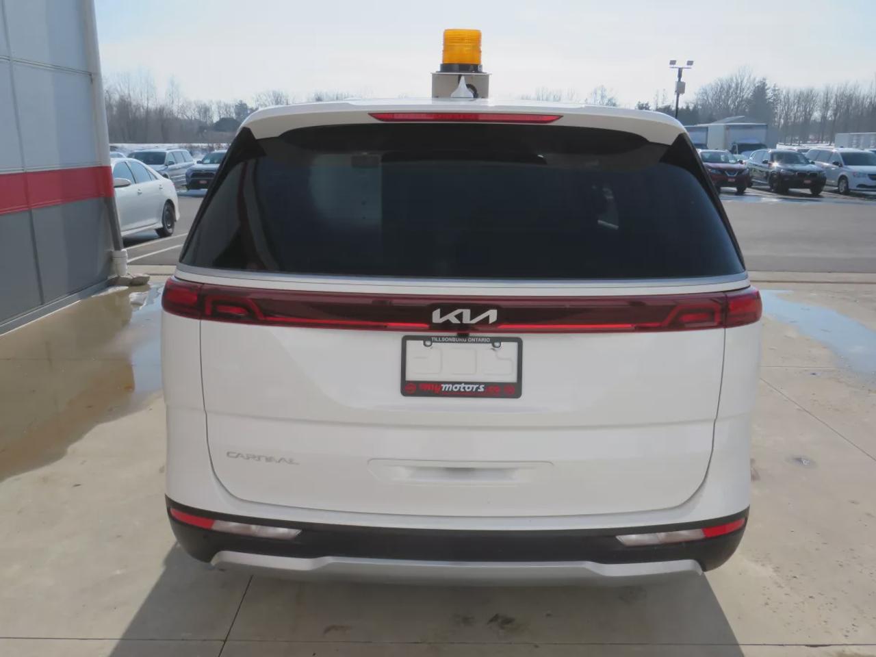 2024 Kia Carnival LX (**RARE!!**GREAT WORK VAN!!**CUSTOM SHELVING UNIT INSTALLED INSIDE!!**ORANGE BECON LIGHT ON ROOF!!**LOW KM!!**ALLOY RIMS**DIGITAL TOUCHSCREEN**REVERSE CAMERA**LANE ASSIST**USB/AUX**ELECTRIC PARKING BRAKE**CRUISE CONTROL**BLUETOOTH**) Photo