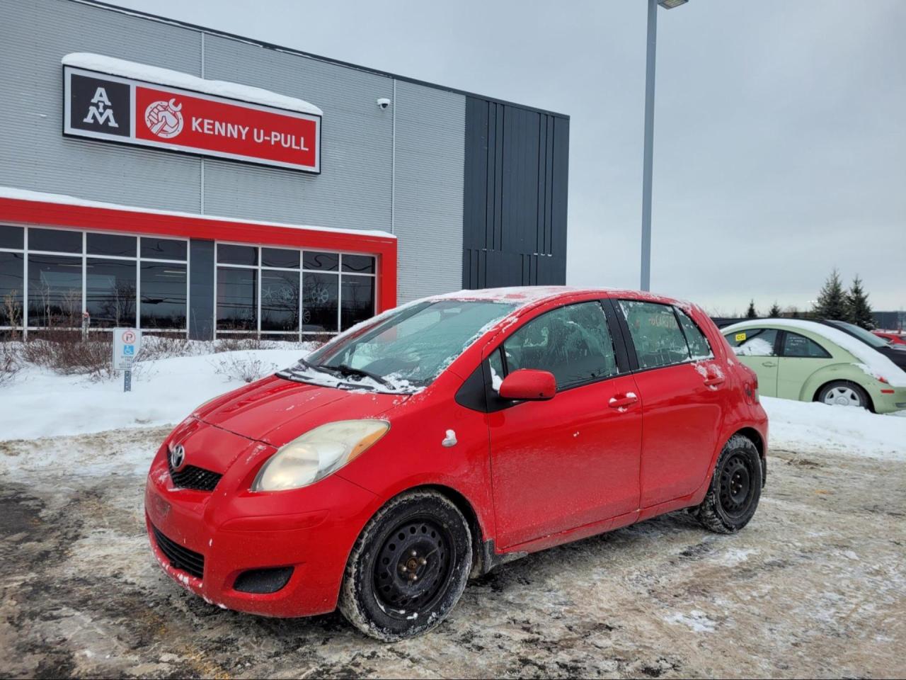 2011 Toyota Yaris in Absolutely Red.The vehicle has 265,496km. Runs and drives ok. The body is in decent shape for the age. Some rust spots here and there. No check engine light. Traction control and ABS lights are on. Slight vibrations felt in the cabin. We dont perform any mechanical/safety inspections. The vehicle is sold as is and might need some work.