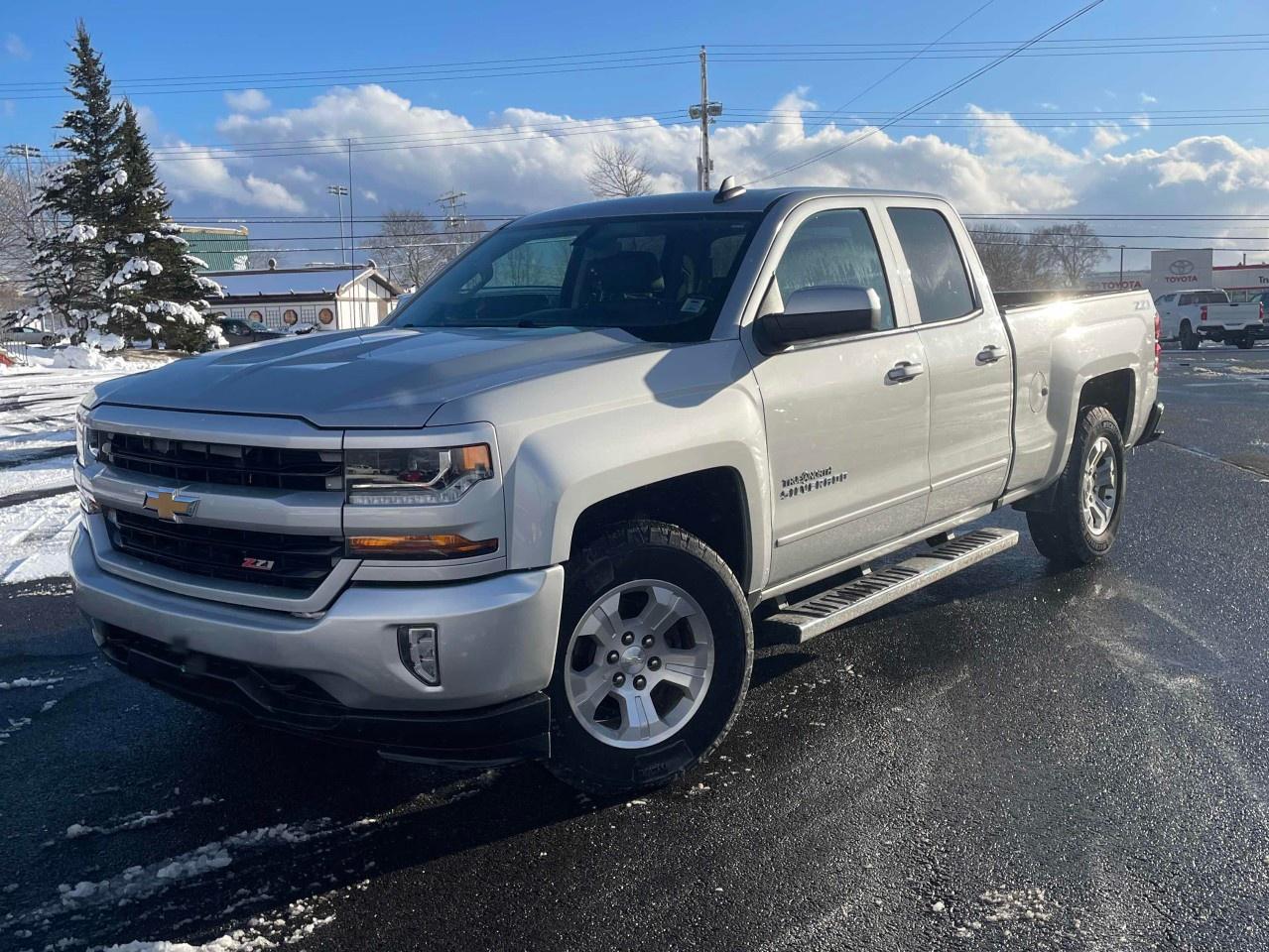 Recent Arrival! 2017 Chevrolet Silverado 1500 LT Double Cab 2LT | 5.3L V8 | Leather Seats | One Owner 6-Speed Automatic Electronic with Overdrive 4WD Silver Ice Metallic EcoTec3 5.3L V8<br /><br /><br />Dealer Maintained, 6-Speed Automatic Electronic with Overdrive, 4WD, Jet Black w/Leather Appointed Seat Trim, 110-Volt AC Power Outlet, 150 Amp Alternator, 4.2''' Diagonal Colour Display Driver Info Centre, 6 Speaker Audio System, 6''' Rectangular Chromed Tubular Assist Steps (LPO), Alloy wheels, Bluetooth® For Phone, Body Colour Bodyside Mouldings, Body Colour Door Handles, Body Colour Rear Bumper w/Cornersteps, Body-Colour Grille Surround, Body-Colour Headlamp Bezels, Body-Colour Mirror Caps, Body-Colour Pwr Adjustable Heated Outside Mirrors, Chrome Grille Surround, Colour-Keyed Carpeting w/Rubberized Vinyl Floor Mats, Deep-Tinted Glass, Driver & Front Passenger Illuminated Vanity Mirrors, Dual-Zone Automatic Climate Control, Electric Rear-Window Defogger, Exterior Parking Camera Rear, EZ Lift & Lower Tailgate, Front Body-Colour Bumper, Front Chrome Bumper, Front Frame-Mounted Black Recovery Hooks, Heavy-Duty Rear Locking Differential, Hill Descent Control, Leather Wrapped Steering Wheel w/Cruise Controls, Manual Tilt Wheel Steering Column, Off-Road Suspension Package, OnStar 6 Months Guidance Plan, OnStar w/4G LTE, Power steering, Power windows, Power Windows w/Driver Express Up, Preferred Equipment Group 1LT, Preferred Equipment Group 2LT, Premium audio system: Chevrolet MyLink, Rear 60/40 Folding Bench Seat (Folds Up), Rear Chrome Bumper, Rear Vision Camera, Rear Wheelhouse Liners, Remote Keyless Entry, Remote keyless entry, Remote Locking Tailgate, Remote Vehicle Starter System, Single Slot CD/MP3 Player, Steering Wheel Audio Controls, Theft Deterrent System (Unauthorized Entry), Thin Profile LED Fog Lamps, Tilt steering wheel, Trailering Package, True North Edition.<br /><br /><br />This vehicle is Zacks Certified! You're approved! We work with you. Together we'll find a solution that makes sense for your individual situation. Please visit us or call 902 843-3900 to learn about our great selection.<br /><br />With 22 lenders available Zack's Auto Sales can offer our customers with the lowest available interest rate. Thank you for taking the time to check out our selection!