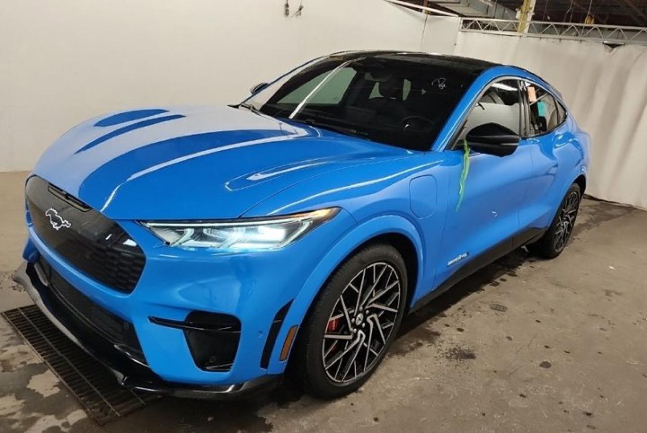 Come see this certified 2021 Ford Mustang Mach-E GT Performance AWD | Extended Range | Leather | Glass Top | Bluecruise | Nav | 360 Cam & Much More !. Its Automatic transmission and 0.0 engine will keep you going. This Ford Mustang Mach-E features the following options: Navigation System, Leather, Air Conditioning, 360 Camera, Tilt Steering Wheel, Steering Radio Controls, Power Windows, Power Locks, Traction Control, and Power Mirrors. Test drive this vehicle at Mark Wilsons Better Used Cars, 5055 Whitelaw Road, Guelph, ON N1H 6J4.MASSIVE SELECTION: 500+ vehicles in ONE LOCATION, all Live Market Priced for the best value!STRAIGHTFORWARD & TRANSPARENT PRICING: Our Advertised Price INCLUDES:Safety Certification! (No separate certification fee upcharge).FREE Carfax History Report!NO upcharge for paying cash!CONFIDENCE & PEACE OF MIND: 30-Day/3,000 km Warranty INCLUDED! Plus a 5-Day Exchange Privilege!*EASY FINANCING: Better-than-bank rates, $0 Down, and 3 Months No Payments available OAC. BAD CREDIT APPROVED HERE!WE BUY CARS: Get Top Dollar for your trade, or sell us your vehicle for CASH even if you dont buy ours!www.shopwilsons.comAn Honest, Transparent Buying Experience. Trusted in business since 1961!(Cash Prices Exclude HST and Licensing Fees only.)