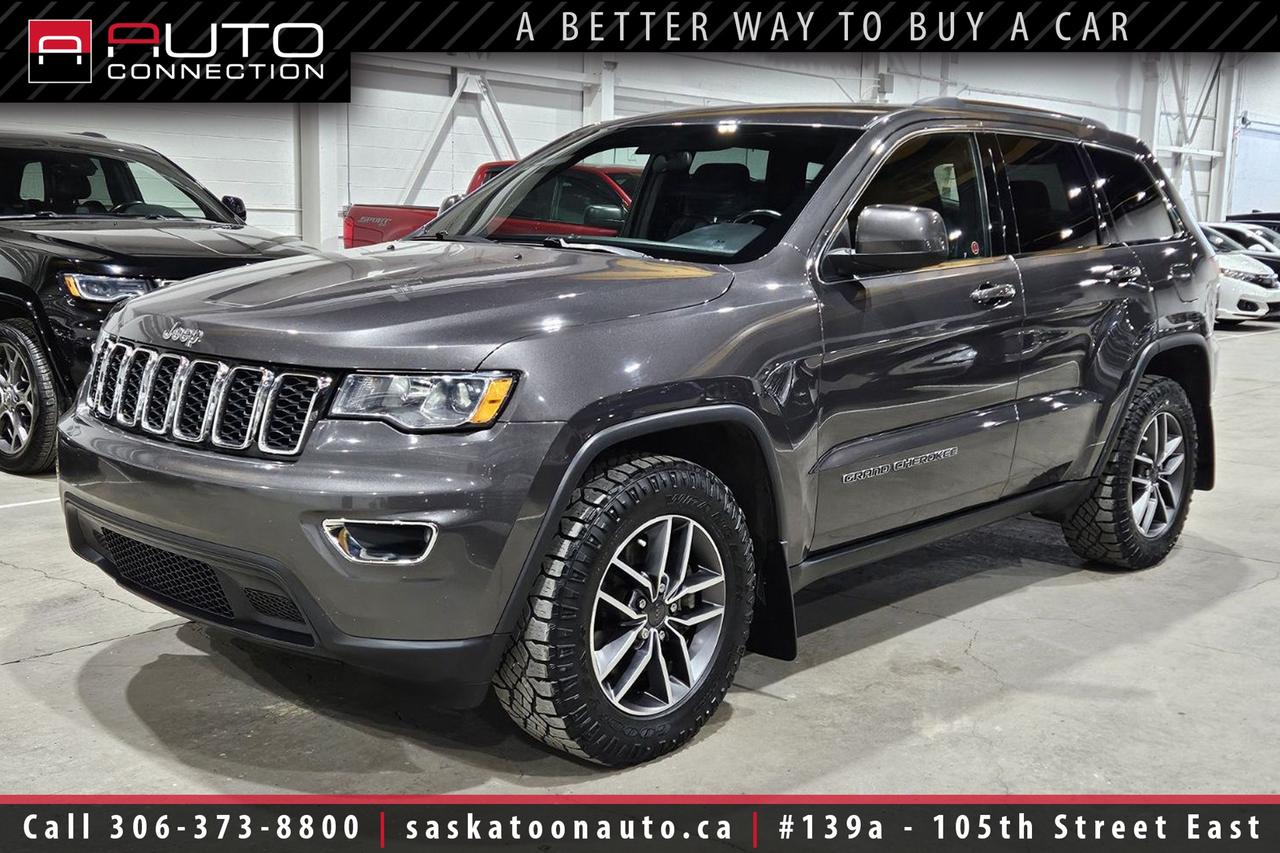 <p><span><font color=#000000><span>Financing & Warranty Available!</span><span><br></span></font></span><span><br></span><span>Accident Free - Regularly Maintained - SK Vehicle</span><span><br></span><span><br>This accident-free, Saskatchewan-owned <b>2021 Jeep Grand Cherokee Laredo</b> in Granite Crystal Metallic delivers the confident presence and capability drivers expect from Jeep, backed by consistent local maintenance. Under the hood, the proven 3.6L Pentastar V6 and intelligent 4x4 system provide strong performance and year-round traction, making it equally comfortable on winter roads or open highways. Step inside and you are greeted by a thoughtfully designed cabin featuring heated front seats, a heated steering wheel, dual-zone automatic climate control, and a 12-way power drivers seat that elevate everyday comfort. The intuitive Uconnect 4C NAV system with its large 8.4-inch touchscreen seamlessly integrates navigation, Apple CarPlay, Android Auto, HD Radio, and a built-in 4G LTE Wi-Fi hotspot to keep everyone connected on the go. Advanced safety technology, including Blind-Spot Monitoring, Rear Cross-Path Detection, Park-Sense rear park assist, and a ParkView backup camera, adds confidence to every drive. Convenience is front and center with remote start, keyless entry with push-button start, and a power liftgate that simplify busy routines. When adventure calls, the Trailer Tow Group IV with Class IV hitch receiver and rear load-levelling suspension delivers the capability needed for trailers, campers, or recreational gear. Finished with bold 18-inch polished aluminum wheels and a clean Black cloth interior, this Grand Cherokee Laredo is a versatile, well-equipped SUV that is ready to impress.<br><br></span><span>Key Features:</span><span><br></span><span><br>- 4x4<br>- Heated Seats<br>- Heated Steering Wheel<br>- Remote Start<br>- Apple CarPlay & Android Auto Compatibility<br>- GPS Navigation<br>- Park-Sense Rear Park Assist System<br>- ParkView Rear Back-Up Camera<br>- Blind-Spot Monitoring<br>- Rear Cross-Path Detection<br>- Power Liftgate<br>- Keyless Enter n Go w/ Push-Button Start<br>- Dual-Zone Automatic Climate Control<br>- Uconnect 4C NAV w/ 8.4-Inch Touchscreen Display<br>- HD Radio<br>- 4G LTE Wi-Fi Hotspot<br>- Multi-View Display Cluster w/ Off-Road Display Pages<br>- 12-Way Power Drivers Seat<br>- Universal Garage Door Opener<br>- 115V Auxiliary Power Outlet<br></span><span>- 18-Inch Polished Aluminum Wheels / Technical Grey Pockets</span><span><br>- Trailer Tow Group IV<br>- Class IV Hitch Receiver<br>- Rear Load-Levelling Suspension<br>- 3.6L Pentastar 6-Cylinder Engine<br><br><b>Exterior Colour:</b> Granite Crystal Metallic<br><b>Interior Colour:</b> Black Cloth<br><br><b>Manufacturers Brochure:</b> </span><a href=https://autocatalogarchive.com/wp-content/uploads/2021/02/Jeep-Grand-Cherokee-2021-CA.pdf target=_blank><span>https://autocatalogarchive.com/wp-content/uploads/2021/02/Jeep-Grand-Cherokee-2021-CA.pdf</span></a><span><br><br></span><span>Unlock a full year of exclusive VIP benefits with your purchase! Enjoy 20% off labour, 25% off tires, free windshield stone chip repairs, and so much more. Visit saskatoonauto.ca for all the details.<br></span><span><br>Honesty Pricing eliminates the haggle hassle by providing you with our lowest possible selling price up front. In fact, it is the lowest price in our market, and we will prove it by disclosing a comprehensive market report of what our competitors are selling similar vehicles for.<br></span><span><br>This vehicle meets our Diamond Certification standard, which begins by selecting only premium quality vehicles and subjecting them to a much more comprehensive inspection process than typical dealerships use. Diamond Certified ensures a clean history, exceptional appearance and problem-free operation.<br></span><span><br>At Saskatoon Auto Connection we sell pre-owned automobiles the way we would like to buy them ourselves. Since 2008, we have been dedicated to providing the highest level of integrity and transparency in our industry, in combination with the highest quality vehicles at the most competitive prices in Saskatchewan. Our friendly staff is ready to positively redefine your expectations of the pre-owned automobile space.</span><span></span></p>