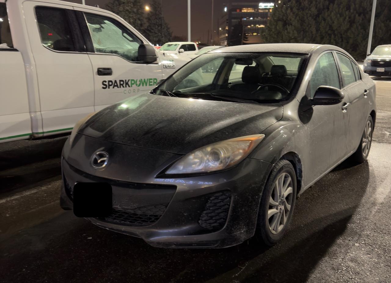 2012 Mazda MAZDA3 GX INCOMING | GRAPHITE MICA | BLACK CLOTH SEAT TRIM Photo2