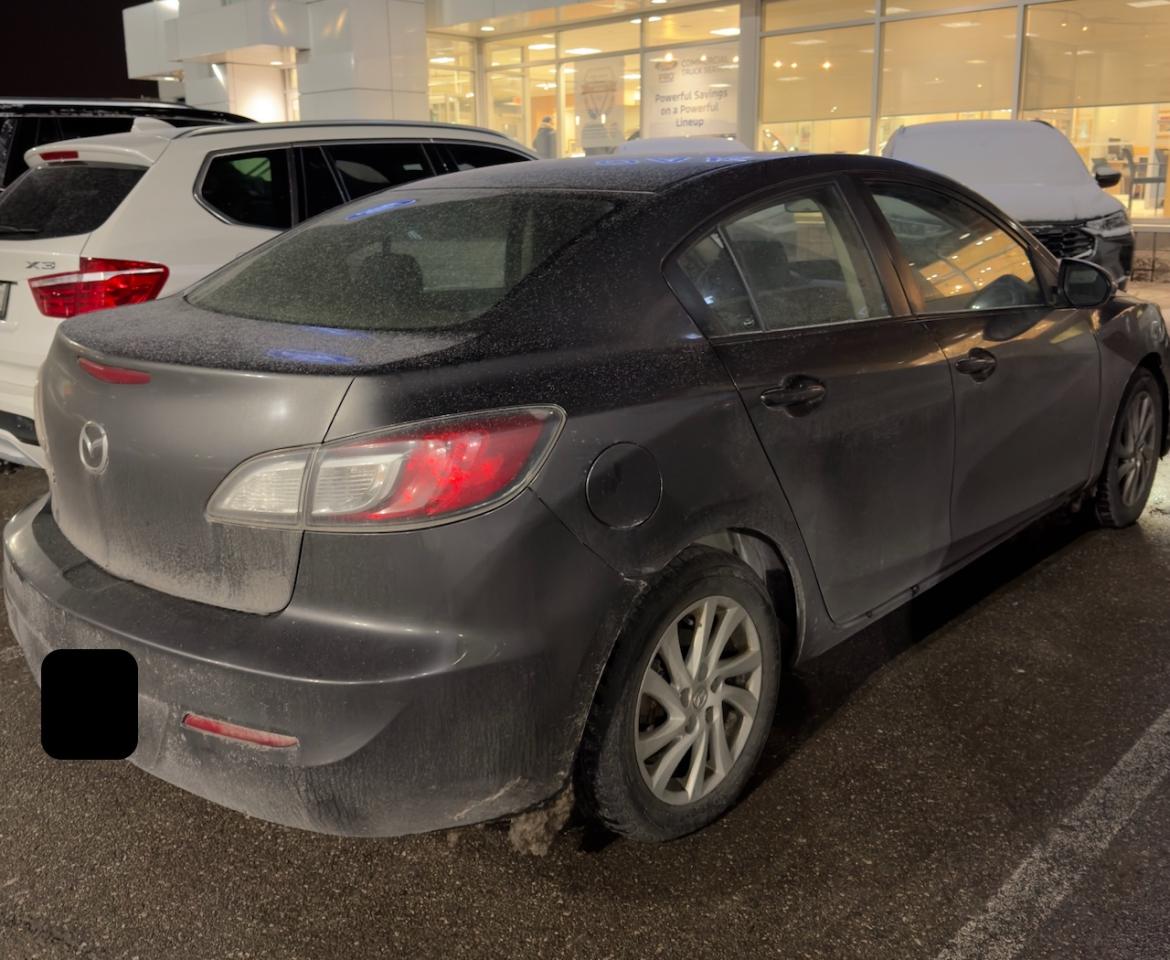 2012 Mazda MAZDA3 GX INCOMING | GRAPHITE MICA | BLACK CLOTH SEAT TRIM Photo