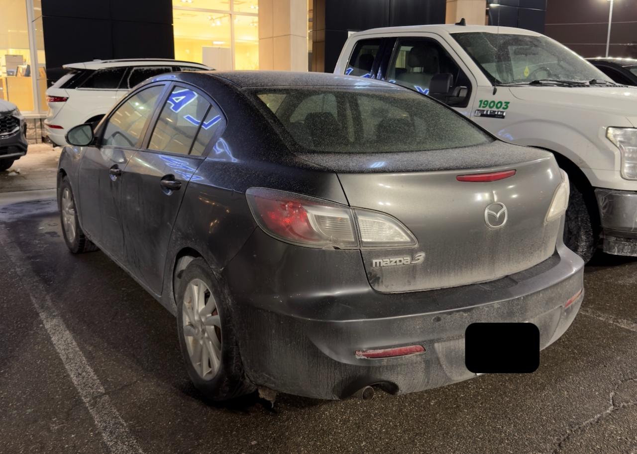 2012 Mazda MAZDA3 GX INCOMING | GRAPHITE MICA | BLACK CLOTH SEAT TRIM Photo