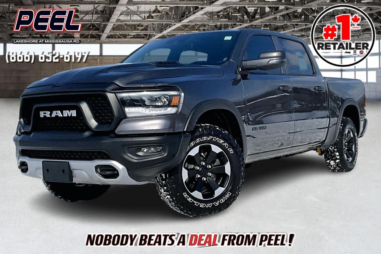 COME SEE WHY NOBODY BEATS A DEAL FROM PEEL! Your Source for ALL make and models used cars and trucks. The True #1 Stellantis Retailer in Ontario for 14 years and running!! (*)

2024 Ram 1500 Rebel Crew Cab 4X4 | 5.7L V8 w/ eTorque | Granite Crystal Metallic | Uconnect 8.4" Touchscreen Display w/ Navigation | Apple CarPlay & Android Auto | Dual-done Automatic Climate Control | Spray-in Bed Liner | Class IV Hitch Receiver | Mopar Deployable Bed Step

One Owner Clean Carfax

Built for drivers who want comfort with real muscle, this 2024 Ram 1500 Rebel Crew Cab sets a confident tone inside with supportive seating, generous rear legroom, and dual zone automatic climate control that keeps every mile relaxed. The Uconnect 8.4 inch display with navigation pairs seamlessly with Apple CarPlay and Android Auto so maps, calls, and music stay simple and distraction free. Outside, Granite Crystal Metallic underscores the Rebel&rsquo;s tough stance, while 4x4 traction and the 5.7L eTorque V8 deliver smooth power for highway passing and weekend trails, and real utility comes from a spray in bed liner, a Class IV hitch for towing, and a Mopar deployable bed step that makes loading easy. With One Owner Clean Carfax history, this Rebel blends comfort, tech, and true truck capability at a smart value.
______________________________________________________

Engage & Explore with Peel Chrysler: Whether youre inquiring about our latest offers or seeking guidance, 1-866-652-6197 connects you directly. Dive deeper online or connect with our team to navigate your automotive journey seamlessly.

WE TAKE ALL TRADES & CREDIT. WE SHIP ANYWHERE IN CANADA! OUR TEAM IS READY TO SERVE YOU 7 DAYS!
______________________________________________________
Our advertised prices are for consumers (i.e end users) only. 

*FREE CarFax (click the link above to check it out at no cost to you!)*

*FULLY CERTIFIED! (Have you seen some of these other dealers stating in their advertisements that certification is an additional fee? NOT HERE! Our certification is already included in our low sale prices to save you more!)

(*) Based on the Eastern Business Center National Ranking reported sales to actual customers, not including demonstrators.
______________________________________________________

Peel Chrysler  A Trusted Destination: Based in Port Credit, Ontario, we proudly serve customers from all corners of Ontario and Canada including Toronto, Oakville, North York, Richmond Hill, Ajax, Hamilton, Niagara Falls, Brampton, Thornhill, Scarborough, Vaughan, London, Windsor, Cambridge, Kitchener, Waterloo, Brantford, Sarnia, Pickering, Huntsville, Milton, Woodbridge, Maple, Aurora, Newmarket, Orangeville, Georgetown, Stouffville, Markham, North Bay, Sudbury, Barrie, Sault Ste. Marie, Parry Sound, Bracebridge, Gravenhurst, Oshawa, A250680Bjax, Kingston, Innisfil and surrounding areas. On our website www.peelchrysler.com, you will find a vast selection of new vehicles including the new and used Ram 1500, 2500 and 3500. Chrysler Grand Caravan, Chrysler Pacifica, Jeep Cherokee, Wrangler and more. All vehicles are priced to sell. We deliver throughout Canada. website or call us 1-866-652-6197. 

Disclaimer Statement: At Peel Chrysler, your satisfaction is our priority. While many pre-owned vehicles originally come with two keys, variations may occur based on trade-ins, and all Peel Chrysler Pre-Owned Vehicles come standard with one key. Any extras provided by the previous owner will be included with your purchase, and additional keys can be bought at the time of sale. Online prices and payments are for finance purchases. Used vehicles that are being financed are subject to a $499 (^$1500 non-prime) financing fee, while cash purchases (certified cheque, bank draft, or wire transfer) on used vehicles have a $2,000 surcharge ( online price + $2,000). Cash purchases of new vehicles only incur applicable taxes and licensing fees, and those priced above $100,000 (including accessories or add-ons) are subject to a federal luxury tax. Optional finance and lease terms are available, and if trading in a vehicle with an outstanding loan balance requiring Peel Chrysler to facilitate the lien payout, a Lien Payout Fee of $349 applies. Prices, rates, and payments are subject to change without notice. While we strive for accuracy, occasional technical or human errors may occur, so we encourage verifying all vehicle details, including features, options, materials, and specifications, with a Peel Chrysler representative by contacting us or visiting our dealership. Experience seamless convenience with our nationwide delivery options. Visit our website or contact us for more details.