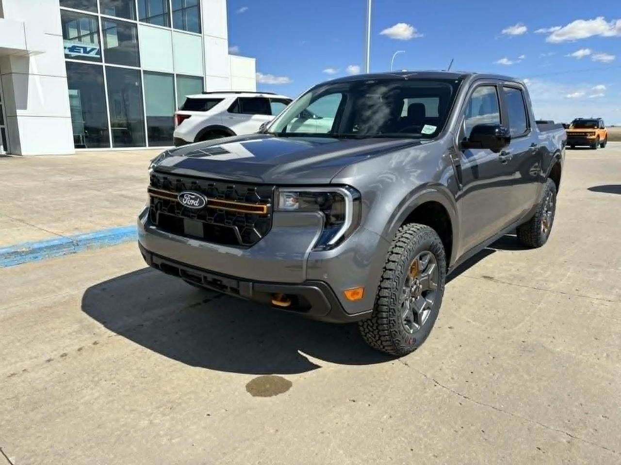 <p>Looking for a rugged and capable pickup thats ready for any adventure? Check out the new 2026 Ford Maverick TREMOR, now available at Webbs 1441! This compact truck is packed with features and ready to take on the Canadian landscape, whether youre heading to the job site or the weekend cabin. The Maverick TREMOR combines practicality with a touch of off-road flair, making it the perfect choice for drivers who want versatility and style.</p><p>This particular Maverick TREMOR is finished in a sleek Carbonized Grey Metallic, turning heads wherever it goes. With its all-wheel drive and powerful 2.0L EcoBoost engine, youll have the confidence to tackle challenging terrain. Inside, youll find a comfortable and durable interior.</p><p>Here are five features that make this Maverick TREMOR stand out:</p><ul><li><strong>TREMOR Trim:</strong> Experience enhanced off-road capability and a bold, aggressive look.</li><li><strong>2.0L EcoBoost Engine:</strong> Get the power you need with impressive fuel efficiency.</li><li><strong>All-Wheel Drive:</strong> Conquer any weather condition with confidence.</li><li><strong>17 Mach Dark Aluminum Wheels:</strong> Make a statement with stylish and capable wheels.</li><li><strong>Power Sliding Rear Window:</strong> Enjoy added convenience and fresh air with the touch of a button.</li></ul><p><strong><em>Powered by AutoIntelligence&trade;</em></strong> Powered by AutoIntelligence&trade;</p>