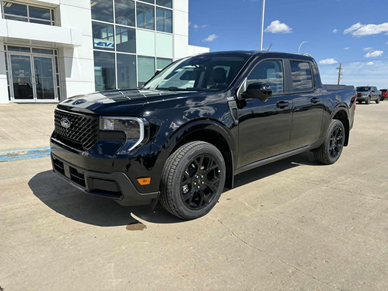 <p>Looking for a versatile and stylish pickup that can handle both city streets and weekend adventures? Then check out this brand new 2026 Ford Maverick Lariat AWD SuperCrew, now available at Webbs 1441. This Shadow Black beauty is ready to turn heads with its sleek design and impressive capability. With its four doors and spacious SuperCrew configuration, this truck offers plenty of room for both passengers and cargo. Its all-wheel-drive system ensures confident handling in various weather conditions, making it perfect for Canadian roads.</p><p>This Maverick Lariat is packed with features designed to enhance your driving experience. The automatic transmission provides smooth and effortless gear changes, while the powerful 2.0L EcoBoost engine delivers both performance and fuel efficiency. Plus, this truck comes equipped with the Black Appearance Package, giving it a bold and modern aesthetic.</p><p>Heres what really makes this truck stand out:</p><ul><li><strong>Black Appearance Package:</strong> This gives the Maverick an undeniably head-turning look.</li><li><strong>4K Tow Package:</strong> Ready to haul whatever your adventure demands.</li><li><strong>19 Black Painted Aluminum Wheels:</strong> Stylish and sporty, these wheels complete the trucks modern look.</li><li><strong>Power Sliding Rear Window:</strong> Adds convenience and fresh air to your drive.</li><li><strong>Connectivity Package:</strong> Stay connected on the go.</li></ul><p><strong><em>Powered by AutoIntelligence&trade;</em></strong> Powered by AutoIntelligence&trade;</p>
