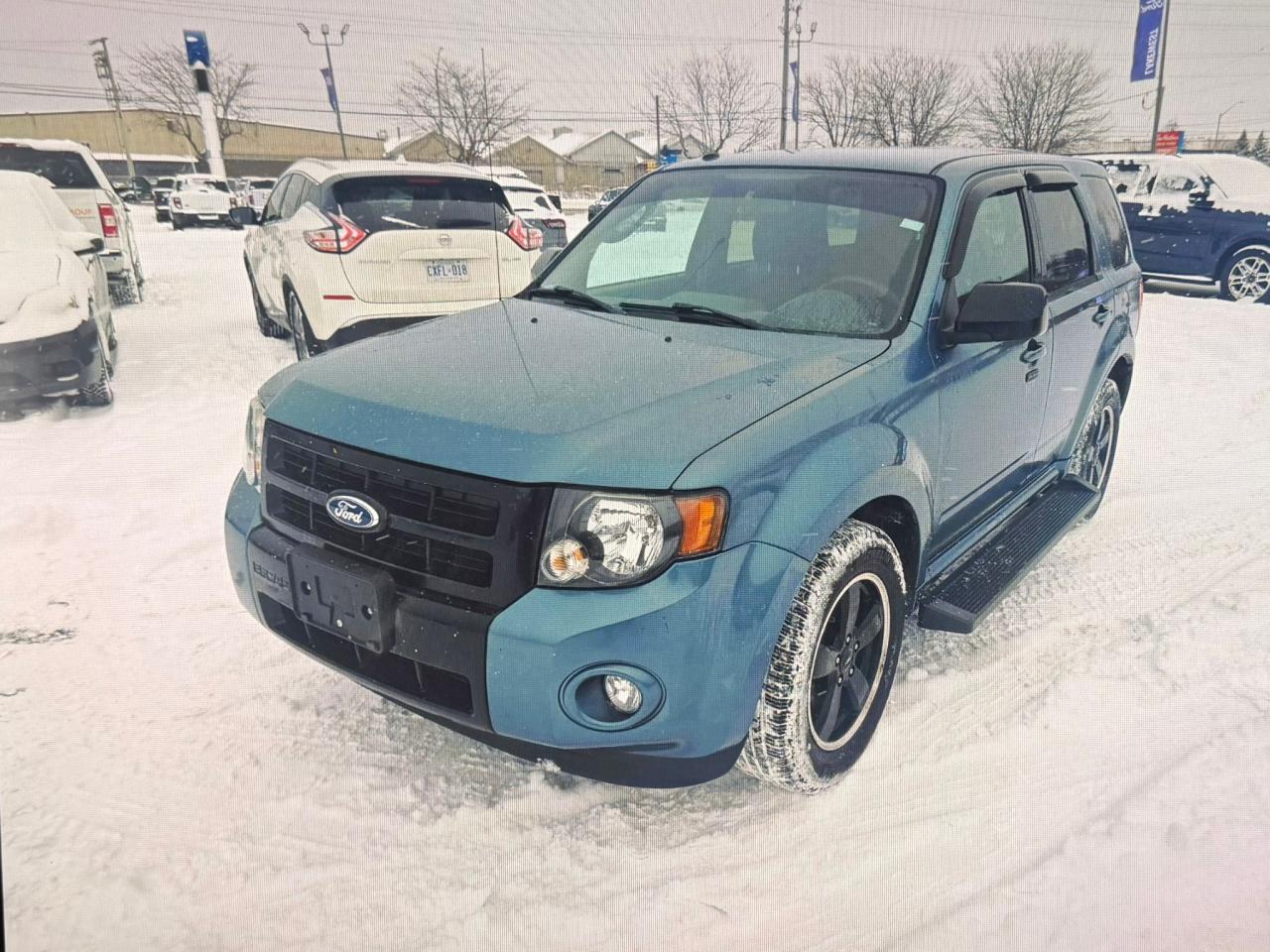 <p class=MsoNormal><span lang=EN-CA style=font-family: Segoe UI Emoji,sans-serif; mso-bidi-font-family: Segoe UI Emoji;>🚙</span><span lang=EN-CA> <strong>2011 FORD ESCAPE &ndash; ONLY 67,000 KM | CERTIFIED | CLEAN CARFAX | IN-HOUSE FINANCING AVAILABLE</strong> </span><span lang=EN-CA style=font-family: Segoe UI Emoji,sans-serif; mso-bidi-font-family: Segoe UI Emoji;>✅</span><span lang=EN-CA><br style=mso-special-character: line-break;><!-- [if !supportLineBreakNewLine]--><br style=mso-special-character: line-break;><!--[endif]--></span></p><p class=MsoNormal><span lang=EN-CA style=font-family: Segoe UI Emoji,sans-serif; mso-bidi-font-family: Segoe UI Emoji;>🔥</span><span lang=EN-CA> <strong>ULTRA LOW MILEAGE &ndash; ONLY 67,000 KM</strong> </span><span lang=EN-CA style=font-family: Segoe UI Emoji,sans-serif; mso-bidi-font-family: Segoe UI Emoji;>🔥</span></p><p class=MsoNormal><span lang=EN-CA style=font-family: Segoe UI Emoji,sans-serif; mso-bidi-font-family: Segoe UI Emoji;>💰</span><span lang=EN-CA> <strong>Price:</strong> $10,995 + HST & Licensing<br></span><span lang=EN-CA style=font-family: Segoe UI Emoji,sans-serif; mso-bidi-font-family: Segoe UI Emoji;>📍</span><span lang=EN-CA> <strong>Dealer:</strong> Precision Motors &ndash; 643 Parkdale Ave N, Hamilton, ON<br></span><span lang=EN-CA style=font-family: Segoe UI Emoji,sans-serif; mso-bidi-font-family: Segoe UI Emoji;>📞</span><span lang=EN-CA> <strong>Call/Text:</strong> 416-270-7657</span></p><p class=MsoNormal><span lang=EN-CA style=font-family: Segoe UI Emoji,sans-serif; mso-bidi-font-family: Segoe UI Emoji;>📝</span><span lang=EN-CA> <strong>Safety Certified | Accident-Free | Fully Inspected | Ready to Drive</strong></span></p><div class=MsoNormal style=text-align: center; align=center><hr align=center size=2 width=100%></div><p class=MsoNormal><strong><span lang=EN-CA style=font-family: Segoe UI Emoji,sans-serif; mso-bidi-font-family: Segoe UI Emoji;>🔍</span><span lang=EN-CA> Vehicle Details</span></strong></p><p class=MsoNormal><span lang=EN-CA style=font-family: Segoe UI Emoji,sans-serif; mso-bidi-font-family: Segoe UI Emoji;>✅</span><span lang=EN-CA> <strong>VIN:</strong> 1FMCU0DG5BKB67787</span></p><p class=MsoNormal><span lang=EN-CA style=font-family: Segoe UI Emoji,sans-serif; mso-bidi-font-family: Segoe UI Emoji;>✅</span><span lang=EN-CA> <strong>Year:</strong> 2011<br></span><span lang=EN-CA style=font-family: Segoe UI Emoji,sans-serif; mso-bidi-font-family: Segoe UI Emoji;>✅</span><span lang=EN-CA> <strong>Make / Model:</strong> Ford Escape<br></span><span lang=EN-CA style=font-family: Segoe UI Emoji,sans-serif; mso-bidi-font-family: Segoe UI Emoji;>✅</span><span lang=EN-CA> <strong>Trim:</strong> XLT<br></span><span lang=EN-CA style=font-family: Segoe UI Emoji,sans-serif; mso-bidi-font-family: Segoe UI Emoji;>✅</span><span lang=EN-CA> <strong>Mileage:</strong> <strong>ONLY 67,000 KM</strong><br></span><span lang=EN-CA style=font-family: Segoe UI Emoji,sans-serif; mso-bidi-font-family: Segoe UI Emoji;>✅</span><span lang=EN-CA> <strong>Transmission:</strong> Automatic<br></span><span lang=EN-CA style=font-family: Segoe UI Emoji,sans-serif; mso-bidi-font-family: Segoe UI Emoji;>✅</span><span lang=EN-CA> <strong>Fuel Type:</strong> Gasoline<br></span><span lang=EN-CA style=font-family: Segoe UI Emoji,sans-serif; mso-bidi-font-family: Segoe UI Emoji;>✅</span><span lang=EN-CA> <strong>Drivetrain:</strong> Front-Wheel Drive (FWD)<br></span><span lang=EN-CA style=font-family: Segoe UI Emoji,sans-serif; mso-bidi-font-family: Segoe UI Emoji;>✅</span><span lang=EN-CA> <strong>Exterior Colour:</strong> Blue<br></span><span lang=EN-CA style=font-family: Segoe UI Emoji,sans-serif; mso-bidi-font-family: Segoe UI Emoji;>✅</span><span lang=EN-CA> <strong>Interior Colour:</strong> Gray<br></span><span lang=EN-CA style=font-family: Segoe UI Emoji,sans-serif; mso-bidi-font-family: Segoe UI Emoji;>✅</span><span lang=EN-CA> <strong>Doors:</strong> 4<br></span><span lang=EN-CA style=font-family: Segoe UI Emoji,sans-serif; mso-bidi-font-family: Segoe UI Emoji;>✅</span><span lang=EN-CA> <strong>Seating:</strong> 5 Passengers</span></p><div class=MsoNormal style=text-align: center; align=center><hr align=center size=2 width=100%></div><p class=MsoNormal><strong><span lang=EN-CA style=font-family: Segoe UI Emoji,sans-serif; mso-bidi-font-family: Segoe UI Emoji;>🌟</span><span lang=EN-CA> Features & Options</span></strong></p><p class=MsoNormal><strong><span lang=EN-CA style=font-family: Segoe UI Emoji,sans-serif; mso-bidi-font-family: Segoe UI Emoji;>🚘</span><span lang=EN-CA> Comfort & Convenience</span></strong></p><p class=MsoNormal><span lang=EN-CA style=font-family: Segoe UI Emoji,sans-serif; mso-bidi-font-family: Segoe UI Emoji;>✅</span><span lang=EN-CA> Heated Front Seats<br></span><span lang=EN-CA style=font-family: Segoe UI Emoji,sans-serif; mso-bidi-font-family: Segoe UI Emoji;>✅</span><span lang=EN-CA> Power Adjustable Driver Seat<br></span><span lang=EN-CA style=font-family: Segoe UI Emoji,sans-serif; mso-bidi-font-family: Segoe UI Emoji;>✅</span><span lang=EN-CA> Remote Keyless Entry<br></span><span lang=EN-CA style=font-family: Segoe UI Emoji,sans-serif; mso-bidi-font-family: Segoe UI Emoji;>✅</span><span lang=EN-CA> Cruise Control<br></span><span lang=EN-CA style=font-family: Segoe UI Emoji,sans-serif; mso-bidi-font-family: Segoe UI Emoji;>✅</span><span lang=EN-CA> Air Conditioning<br></span><span lang=EN-CA style=font-family: Segoe UI Emoji,sans-serif; mso-bidi-font-family: Segoe UI Emoji;>✅</span><span lang=EN-CA> Tilt & Telescopic Steering Wheel</span></p><p class=MsoNormal><strong><span lang=EN-CA style=font-family: Segoe UI Emoji,sans-serif; mso-bidi-font-family: Segoe UI Emoji;>🎵</span><span lang=EN-CA> Entertainment & Connectivity</span></strong></p><p class=MsoNormal><span lang=EN-CA style=font-family: Segoe UI Emoji,sans-serif; mso-bidi-font-family: Segoe UI Emoji;>✅</span><span lang=EN-CA> Bluetooth Hands-Free Calling<br></span><span lang=EN-CA style=font-family: Segoe UI Emoji,sans-serif; mso-bidi-font-family: Segoe UI Emoji;>✅</span><span lang=EN-CA> AM / FM / CD / MP3 Stereo<br></span><span lang=EN-CA style=font-family: Segoe UI Emoji,sans-serif; mso-bidi-font-family: Segoe UI Emoji;>✅</span><span lang=EN-CA> AUX Input<br></span><span lang=EN-CA style=font-family: Segoe UI Emoji,sans-serif; mso-bidi-font-family: Segoe UI Emoji;>✅</span><span lang=EN-CA> Steering Wheel Audio Controls<br></span><span lang=EN-CA style=font-family: Segoe UI Emoji,sans-serif; mso-bidi-font-family: Segoe UI Emoji;>✅</span><span lang=EN-CA> Quality Sound System</span></p><p class=MsoNormal><strong><span lang=EN-CA style=font-family: Segoe UI Emoji,sans-serif; mso-bidi-font-family: Segoe UI Emoji;>🧳</span><span lang=EN-CA> Interior & Utility</span></strong></p><p class=MsoNormal><span lang=EN-CA style=font-family: Segoe UI Emoji,sans-serif; mso-bidi-font-family: Segoe UI Emoji;>✅</span><span lang=EN-CA> Spacious SUV Interior<br></span><span lang=EN-CA style=font-family: Segoe UI Emoji,sans-serif; mso-bidi-font-family: Segoe UI Emoji;>✅</span><span lang=EN-CA> Fold-Flat Rear Seats<br></span><span lang=EN-CA style=font-family: Segoe UI Emoji,sans-serif; mso-bidi-font-family: Segoe UI Emoji;>✅</span><span lang=EN-CA> Large Cargo Area<br></span><span lang=EN-CA style=font-family: Segoe UI Emoji,sans-serif; mso-bidi-font-family: Segoe UI Emoji;>✅</span><span lang=EN-CA> Roof Rails<br></span><span lang=EN-CA style=font-family: Segoe UI Emoji,sans-serif; mso-bidi-font-family: Segoe UI Emoji;>✅</span><span lang=EN-CA> Rear Privacy Glass</span></p><p class=MsoNormal><strong><span lang=EN-CA style=font-family: Segoe UI Emoji,sans-serif; mso-bidi-font-family: Segoe UI Emoji;>🛡️</span><span lang=EN-CA> Safety</span></strong></p><p class=MsoNormal><span lang=EN-CA style=font-family: Segoe UI Emoji,sans-serif; mso-bidi-font-family: Segoe UI Emoji;>✅</span><span lang=EN-CA> Anti-Lock Brakes (ABS)<br></span><span lang=EN-CA style=font-family: Segoe UI Emoji,sans-serif; mso-bidi-font-family: Segoe UI Emoji;>✅</span><span lang=EN-CA> Traction Control<br></span><span lang=EN-CA style=font-family: Segoe UI Emoji,sans-serif; mso-bidi-font-family: Segoe UI Emoji;>✅</span><span lang=EN-CA> Electronic Stability Control (ESC)<br></span><span lang=EN-CA style=font-family: Segoe UI Emoji,sans-serif; mso-bidi-font-family: Segoe UI Emoji;>✅</span><span lang=EN-CA> Front, Side & Curtain Airbags<br></span><span lang=EN-CA style=font-family: Segoe UI Emoji,sans-serif; mso-bidi-font-family: Segoe UI Emoji;>✅</span><span lang=EN-CA> Daytime Running Lights<br></span><span lang=EN-CA style=font-family: Segoe UI Emoji,sans-serif; mso-bidi-font-family: Segoe UI Emoji;>✅</span><span lang=EN-CA> Ontario Safety Certified<br></span><span lang=EN-CA style=font-family: Segoe UI Emoji,sans-serif; mso-bidi-font-family: Segoe UI Emoji;>✅</span><span lang=EN-CA> Clean Carfax Report Included</span></p><div class=MsoNormal style=text-align: center; align=center><hr align=center size=2 width=100%></div><p class=MsoNormal><strong><span lang=EN-CA style=font-family: Segoe UI Emoji,sans-serif; mso-bidi-font-family: Segoe UI Emoji;>💳</span><span lang=EN-CA> FINANCING AVAILABLE &ndash; ALL CREDIT TYPES</span></strong></p><p class=MsoNormal><strong><span lang=EN-CA>At</span></strong><span lang=EN-CA> <strong>Precision Motors</strong>, Approvals are easy:</span></p><p class=MsoNormal><span lang=EN-CA style=font-family: Segoe UI Emoji,sans-serif; mso-bidi-font-family: Segoe UI Emoji;>✅</span><span lang=EN-CA> Good / Bad / No Credit Accepted<br></span><span lang=EN-CA style=font-family: Segoe UI Emoji,sans-serif; mso-bidi-font-family: Segoe UI Emoji;>✅</span><span lang=EN-CA> In-House Financing Available on the spot<br></span><span lang=EN-CA style=font-family: Segoe UI Emoji,sans-serif; mso-bidi-font-family: Segoe UI Emoji;>✅</span><span lang=EN-CA> Low & Flexible Down Payments</span></p><p class=MsoNormal><span lang=EN-CA style=font-family: Segoe UI Emoji,sans-serif; mso-bidi-font-family: Segoe UI Emoji;>✅</span><span lang=EN-CA>Bi-Weekly & Monthly Payments according to your budget<br></span><span lang=EN-CA style=font-family: Segoe UI Emoji,sans-serif; mso-bidi-font-family: Segoe UI Emoji;>✅</span><span lang=EN-CA> Credit Rebuilding Programs<br></span><span lang=EN-CA style=font-family: Segoe UI Emoji,sans-serif; mso-bidi-font-family: Segoe UI Emoji;>✅</span><span lang=EN-CA> Extended Warranties (1</span><span lang=EN-CA style=mso-ascii-font-family: Calibri; mso-hansi-font-family: Calibri; mso-bidi-font-family: Calibri;>&ndash;</span><span lang=EN-CA>3 Years)<br></span><span lang=EN-CA style=font-family: Segoe UI Emoji,sans-serif; mso-bidi-font-family: Segoe UI Emoji;>✅</span><span lang=EN-CA> on the spot Approvals</span></p><div class=MsoNormal style=text-align: center; align=center><hr align=center size=2 width=100%></div><p class=MsoNormal><strong><span lang=EN-CA style=font-family: Segoe UI Emoji,sans-serif; mso-bidi-font-family: Segoe UI Emoji;>🏆</span><span lang=EN-CA> Why Buy From Precision Motors?</span></strong></p><p class=MsoNormal><span lang=EN-CA style=font-family: Segoe UI Emoji,sans-serif; mso-bidi-font-family: Segoe UI Emoji;>✅</span><span lang=EN-CA> Over 20 Years of Experience<br></span><span lang=EN-CA style=font-family: Segoe UI Emoji,sans-serif; mso-bidi-font-family: Segoe UI Emoji;>✅</span><span lang=EN-CA> Family-Owned & Trusted<br></span><span lang=EN-CA style=font-family: Segoe UI Emoji,sans-serif; mso-bidi-font-family: Segoe UI Emoji;>✅</span><span lang=EN-CA> Safety Certification Included<br></span><span lang=EN-CA style=font-family: Segoe UI Emoji,sans-serif; mso-bidi-font-family: Segoe UI Emoji;>✅</span><span lang=EN-CA> Free Carfax Provided<br></span><span lang=EN-CA style=font-family: Segoe UI Emoji,sans-serif; mso-bidi-font-family: Segoe UI Emoji;>✅</span><span lang=EN-CA> Trade-Ins Accepted<br></span><span lang=EN-CA style=font-family: Segoe UI Emoji,sans-serif; mso-bidi-font-family: Segoe UI Emoji;>✅</span><span lang=EN-CA> Vehicles Fully Detailed</span></p><div class=MsoNormal style=text-align: center; align=center><hr align=center size=2 width=100%></div><p class=MsoNormal><span lang=EN-CA style=font-family: Segoe UI Emoji,sans-serif; mso-bidi-font-family: Segoe UI Emoji;>📍</span><span lang=EN-CA> <strong>Precision Motors</strong><br>643 Parkdale Avenue North, Hamilton, ON</span></p><p class=MsoNormal><span lang=EN-CA style=font-family: Segoe UI Emoji,sans-serif; mso-bidi-font-family: Segoe UI Emoji;>📱</span><span lang=EN-CA> <strong>Call or Text:</strong> 416-270-7657<br></span><span lang=EN-CA style=font-family: Segoe UI Emoji,sans-serif; mso-bidi-font-family: Segoe UI Emoji;>🕒</span><span lang=EN-CA> Open 7 Days </span></p><p class=MsoNormal><span lang=EN-CA style=font-family: Segoe UI Emoji,sans-serif; mso-bidi-font-family: Segoe UI Emoji;>🔥</span><span lang=EN-CA> <strong>ONLY 67,000 KM &bull; VERY HARD TO FIND &bull; MUST SEE</strong><br>Perfect for commuting very economical students, Uber, or daily driving.</span></p><p class=MsoNormal><span lang=EN-CA style=font-family: Segoe UI Emoji,sans-serif; mso-bidi-font-family: Segoe UI Emoji;>📲</span><span lang=EN-CA> <strong>Message now to book your test drive &mdash; Low KM vehicles don&rsquo;t last!</strong> </span><span lang=EN-CA style=font-family: Segoe UI Emoji,sans-serif; mso-bidi-font-family: Segoe UI Emoji;>✅</span></p><p class=MsoNormal><span lang=EN-CA>&nbsp;</span></p>