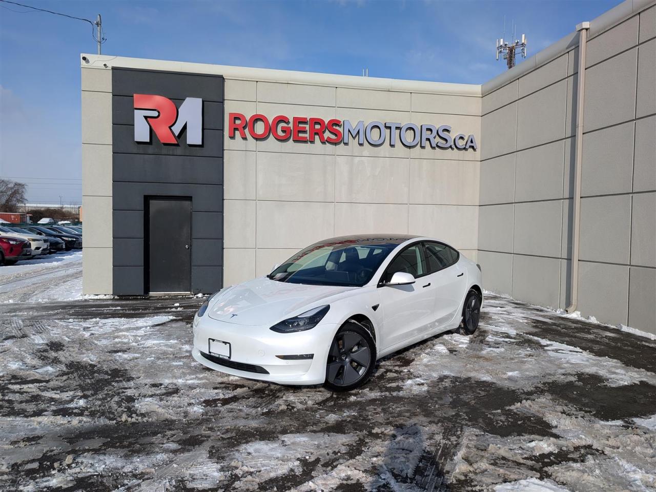 <p>Limited Time Offer: Financing at 6.99% / 6 Months Payment Deferral / $0 Down Payment / Private Viewings Available / Appointments Preferred / Online Purchase and FREE Delivery Available / Curbside Pick Up Available<br style=color: rgba(0, 0, 0, 0.87);text-align: left;/><br style=color: rgba(0, 0, 0, 0.87);text-align: left;/><br style=color: rgba(0, 0, 0, 0.87);text-align: left;/>ALL WHEEL DRIVE / LONG RANGE / NAVIGATION / BLINDSPOT ASSIST / FRONT COLLISION WARNING / LANE ASSIST / 360 CAMERA / PANORAMIC ROOF / BLUETOOTH / POWER LIFT GATE / HEATED STEERING AND SEATS / SMART KEY / And More...<br style=color: rgba(0, 0, 0, 0.87);text-align: left;/><br style=color: rgba(0, 0, 0, 0.87);text-align: left;/><br style=color: rgba(0, 0, 0, 0.87);text-align: left;/>While walk-ins are welcome, we encourage scheduling appointments for a smoother and more personalized experience.<br style=color: rgba(0, 0, 0, 0.87);text-align: left;/><br style=color: rgba(0, 0, 0, 0.87);text-align: left;/><br style=color: rgba(0, 0, 0, 0.87);text-align: left;/>This 2022 Tesla Model 3 is equipped with luxury features including Navigation, Sunroof, Leather, Power Windows, Power Locks, Heated Seats, Bluetooth Connectivity, Premium Sound System, and much more. Meticulously maintained, both the exterior and interior are in great condition. Prices are subject to taxes, certification, and licensing. Trade-ins are welcomed.<br style=color: rgba(0, 0, 0, 0.87);text-align: left;/><br style=color: rgba(0, 0, 0, 0.87);text-align: left;/><br style=color: rgba(0, 0, 0, 0.87);text-align: left;/>Financing Available For All Credit Types Starting at 6.99% O.A.C. Up To 6 Months Payment Deferral Available. Our financing options cater to individuals with good, bad, or no credit history. Additionally, we offer up to 6 months with no payments and completely open loans with no early repayment fees. Our streamlined credit application process ensures quick approvals. Same-day delivery options are also accessible.<br style=color: rgba(0, 0, 0, 0.87);text-align: left;/><br style=color: rgba(0, 0, 0, 0.87);text-align: left;/><br style=color: rgba(0, 0, 0, 0.87);text-align: left;/>Our state-of-the-art 10,000 square foot auto service center is staffed with licensed mechanics and is open to the public. From routine maintenance like oil changes and brake services to major repairs such as engine replacements, our service center caters to all automotive needs. Loaner vehicles are available for extended service requirements.<br style=color: rgba(0, 0, 0, 0.87);text-align: left;/><br style=color: rgba(0, 0, 0, 0.87);text-align: left;/><br style=color: rgba(0, 0, 0, 0.87);text-align: left;/>We are Oakvilles premier destination for rust proofing services. Schedule an appointment to protect your vehicle from corrosion.<br style=color: rgba(0, 0, 0, 0.87);text-align: left;/><br style=color: rgba(0, 0, 0, 0.87);text-align: left;/><br style=color: rgba(0, 0, 0, 0.87);text-align: left;/>Experience Excellence at Rogers Motors. Rogers Motors proudly stands as Oakvilles largest used car dealership, renowned for providing top-quality used vehicles including cars, trucks, SUVs, and minivans. Family-owned and operated since 2004, with over 10,000 vehicles sold, we are committed to delivering exceptional service.<br style=color: rgba(0, 0, 0, 0.87);text-align: left;/><br style=color: rgba(0, 0, 0, 0.87);text-align: left;/><br style=color: rgba(0, 0, 0, 0.87);text-align: left;/>At Rogers Motors, we prioritize customer satisfaction above all else. With a focus on love, honesty, integrity, and transparency, we strive to ensure that every guest leaves our dealership happier than when they arrived. With an average rating of 4.9/5 from over 1000 online reviews, we invite you to experience car shopping and service the way it should be.<br style=color: rgba(0, 0, 0, 0.87);text-align: left;/><br style=color: rgba(0, 0, 0, 0.87);text-align: left;/><br style=color: rgba(0, 0, 0, 0.87);text-align: left;/>Rogers Motors. Driving Happiness.<br style=color: rgba(0, 0, 0, 0.87);text-align: left;/>Visit our website to see all our current inventory.<br/></p>